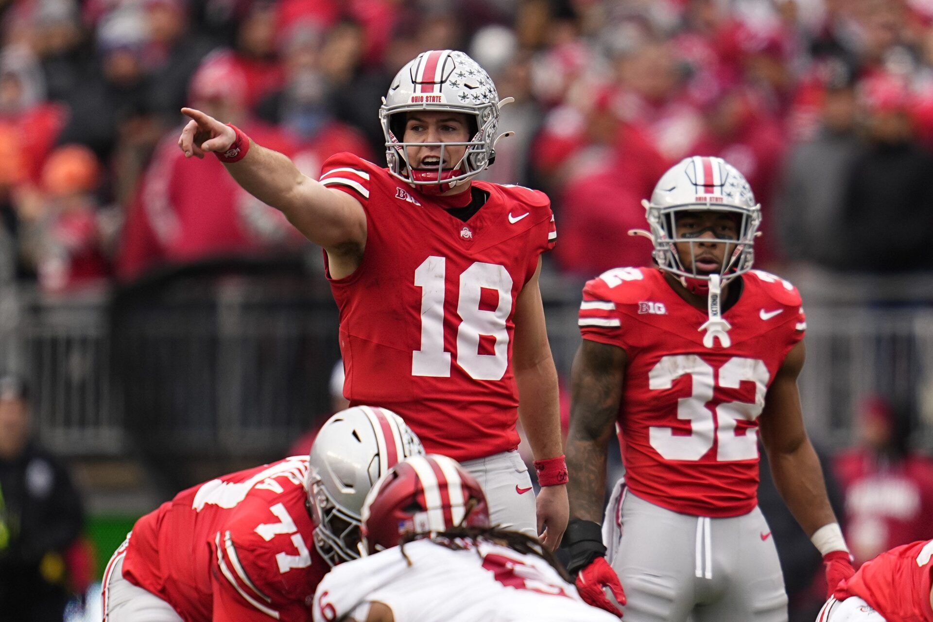 Ohio State Buckeyes quarterback Will Howard (18) signals to his offense during the second half of the NCAA football game against the Indiana Hoosiers at Ohio Stadium in Columbus on Saturday, Nov. 23, 2024. Ohio State won 38-15.