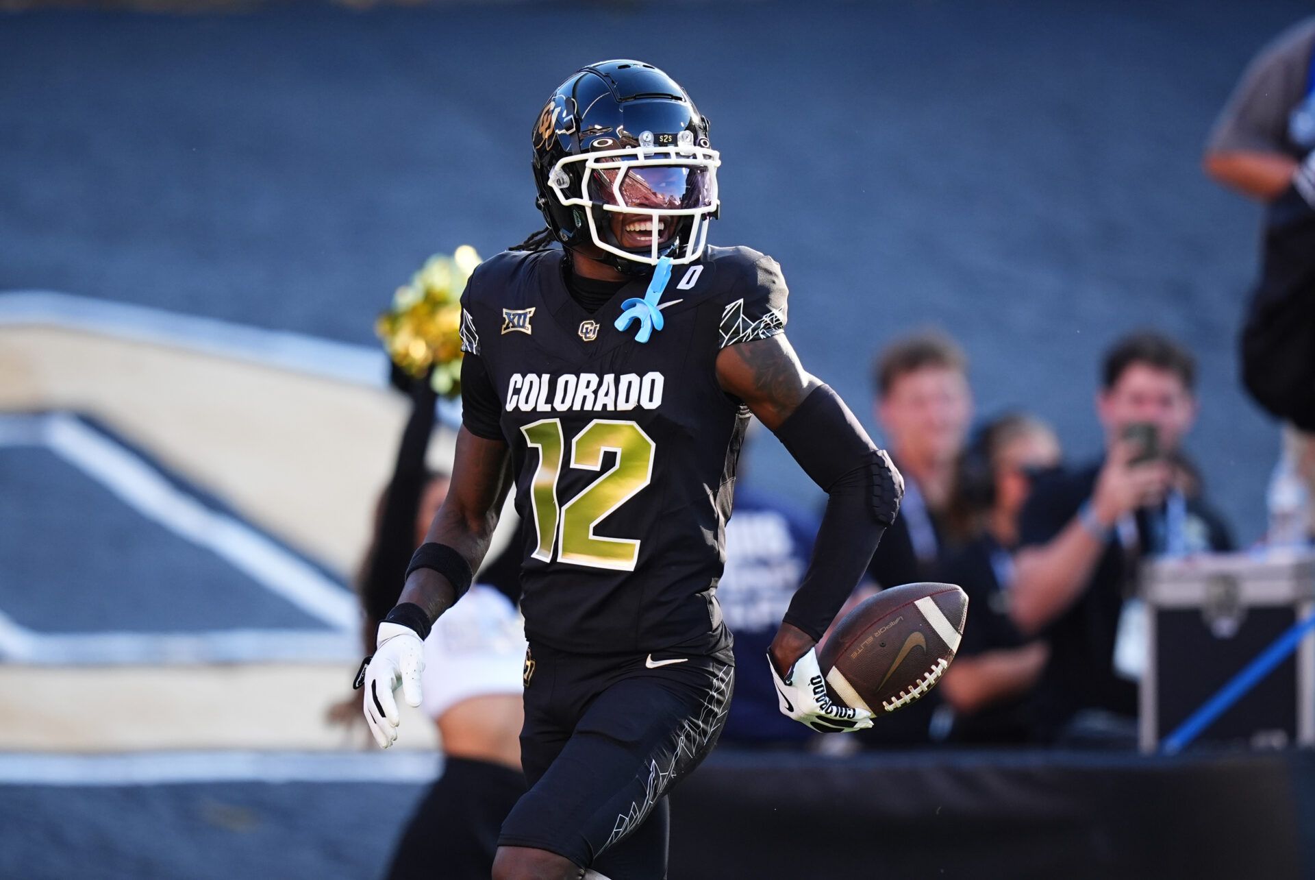 Aug 29, 2024; Boulder, Colorado, USA; Colorado Buffaloes wide receiver Travis Hunter (12) reacts after scoring a touchdown in the first half against the North Dakota State Bison at Folsom Field. Mandatory Credit: Ron Chenoy-USA TODAY Sports