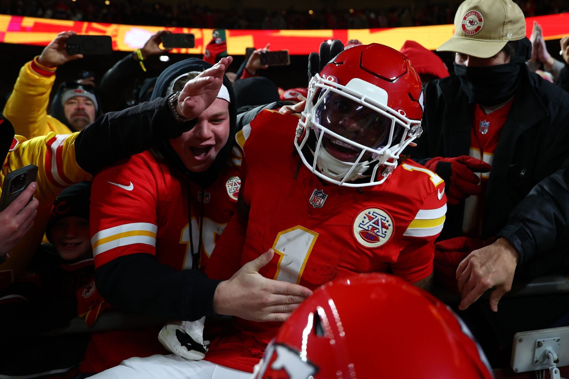 Kansas City Chiefs wide receiver Xavier Worthy (1) reacts with fans after a touchdown against the Buffalo Bills during the first half in the AFC Championship game at GEHA Field at Arrowhead Stadium.