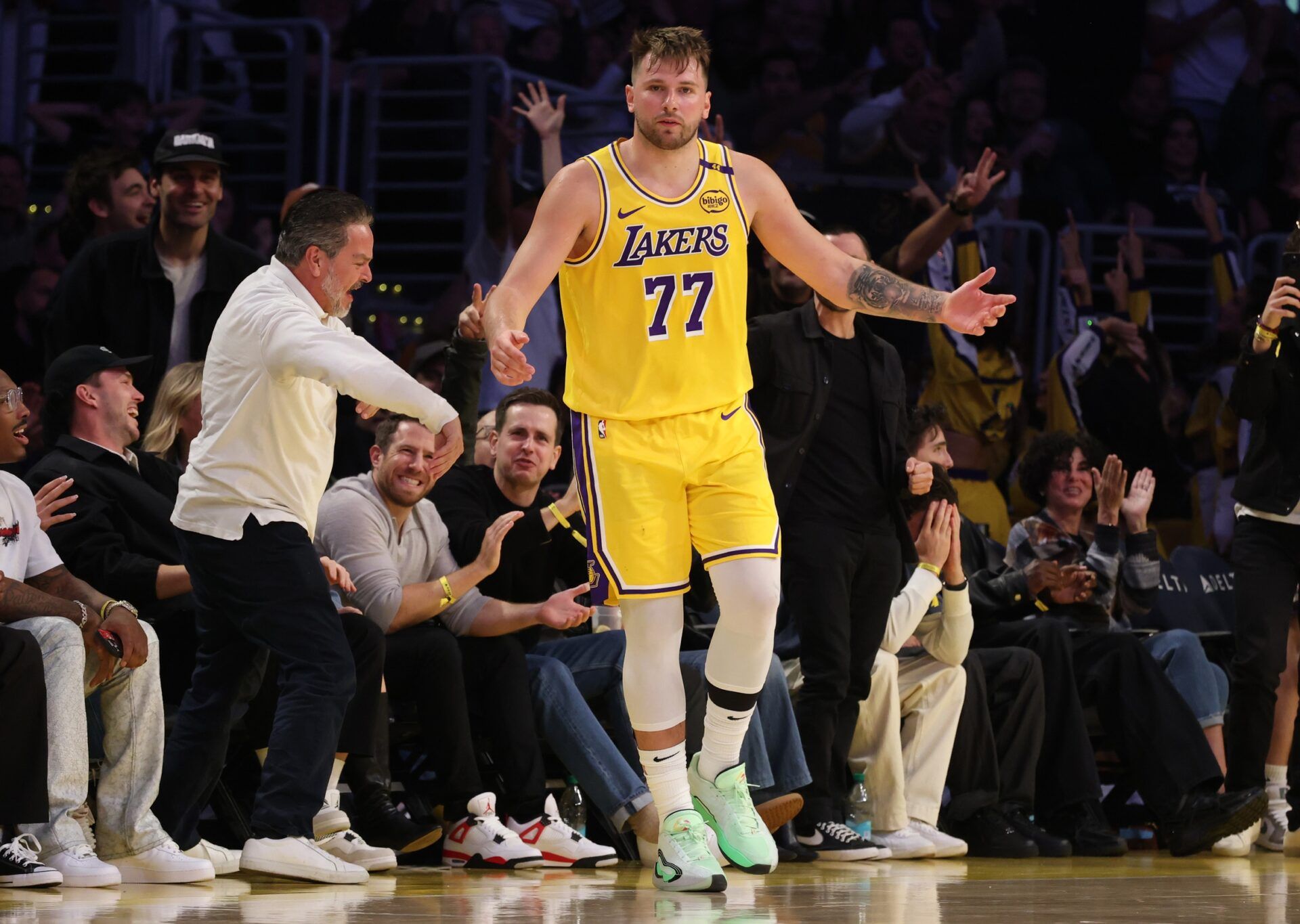 Los Angeles Lakers guard Luka Doncic (77) reacts after making a basket during the fourth quarter against the Minnesota Timberwolves at Crypto.com Arena.