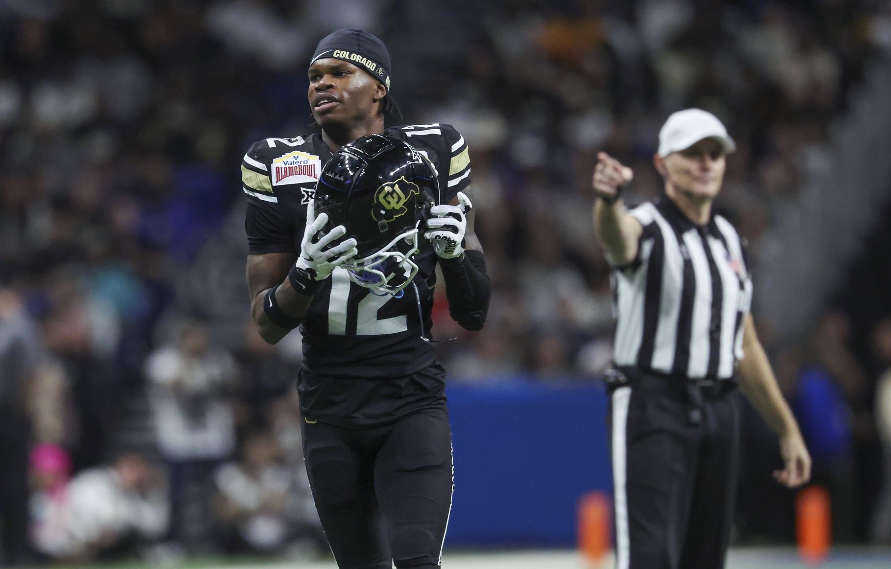 Colorado Buffaloes wide receiver Travis Hunter (12) reacts after a penalty is called during the second quarter against the Brigham Young Cougars at Alamodome.