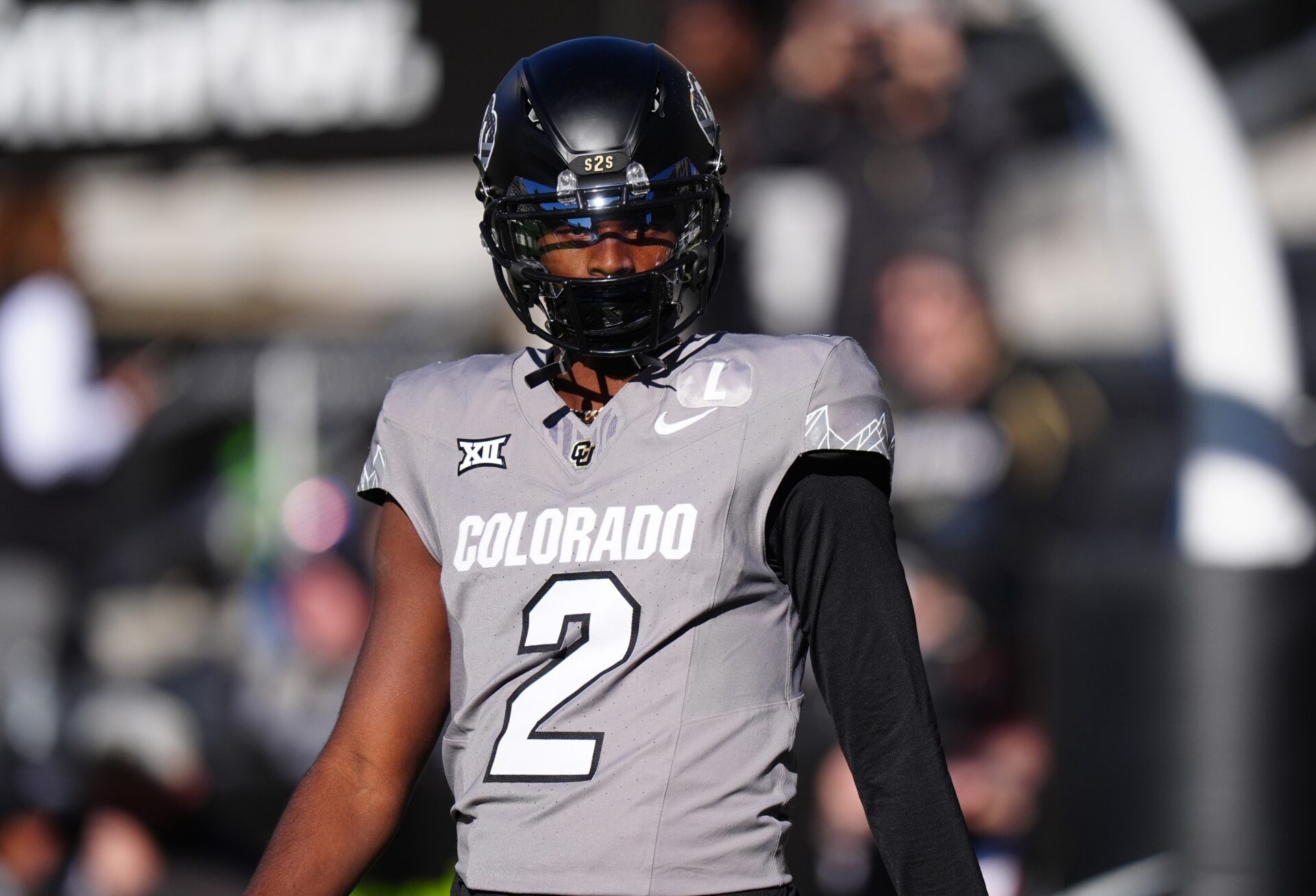 Colorado Buffaloes quarterback Shedeur Sanders (2) looks on before the game against the Utah Utes at Folsom Field.