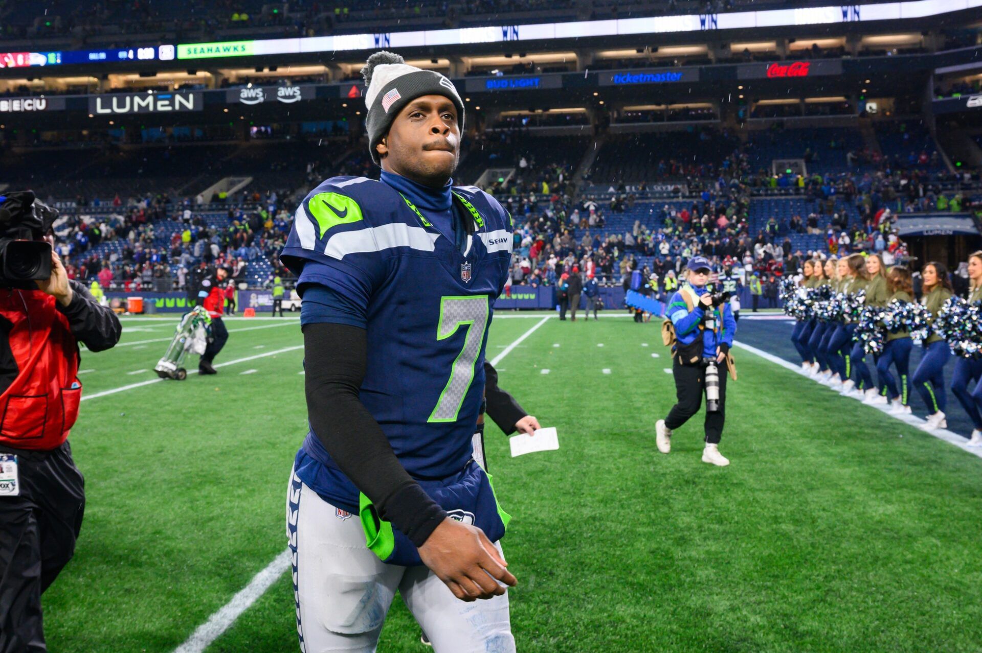 Seattle Seahawks quarterback Geno Smith (7) walks off the field after the game against the Arizona Cardinals at Lumen Field.