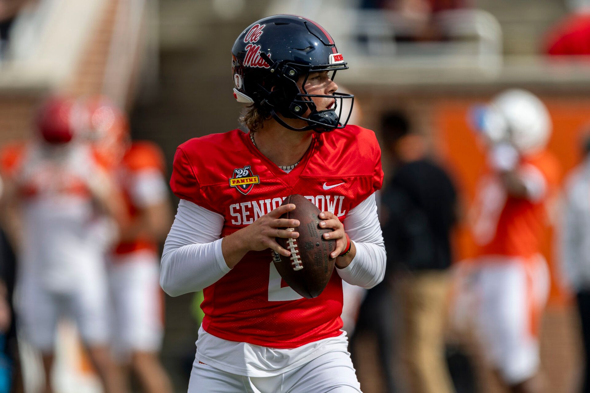 Jan 28, 2025; Mobile, AL, USA; American team quarterback Jaxson Dart of Ole Miss (2) drops to pass during Senior Bowl practice for the American team at Hancock Whitney Stadium. Mandatory Credit: Vasha Hunt-Imagn Images