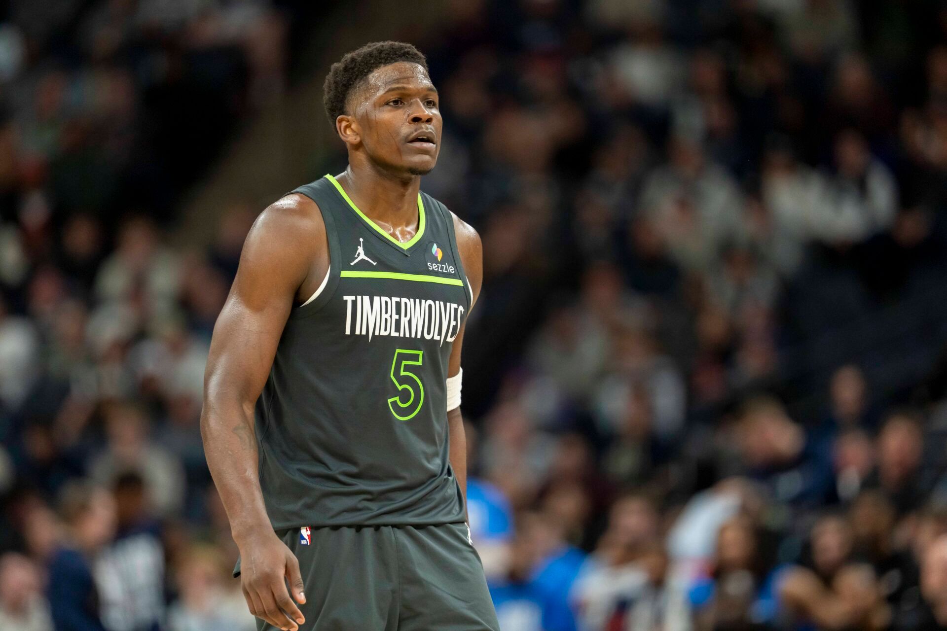 Feb 23, 2025; Minneapolis, Minnesota, USA; Minnesota Timberwolves guard Anthony Edwards (5) looks on during a free throw against the Oklahoma City Thunder in the second half at Target Center. Mandatory Credit: Jesse Johnson-Imagn Images