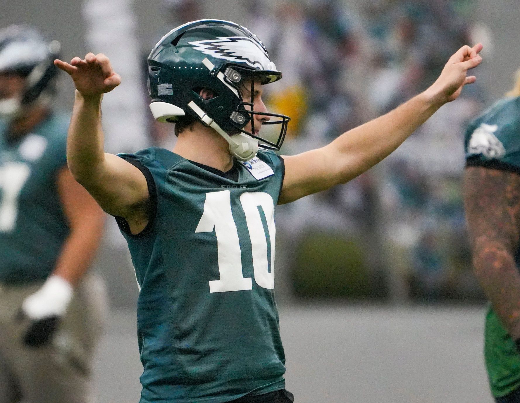 WATCH: Eagles Punter Braden Mann Practices PAT Holds With Wife Kylie on Island Getaway