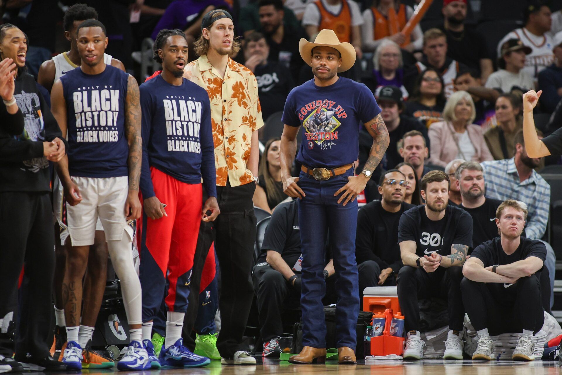 New Orleans Pelicans forward Bruce Brown (00) on the sideline against the Phoenix Suns in the fourth quarter at Footprint Center.