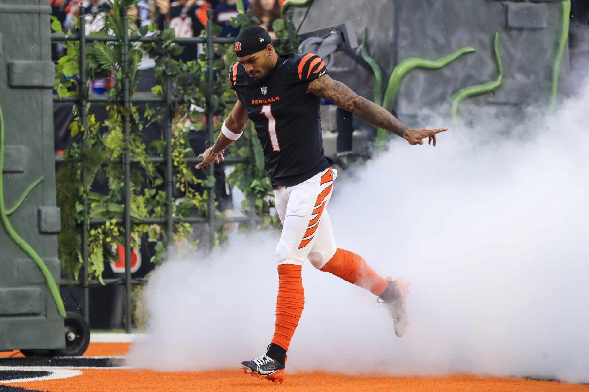 Cincinnati Bengals wide receiver Ja'Marr Chase (1) runs onto the field before the game against the Denver Broncos at Paycor Stadium.