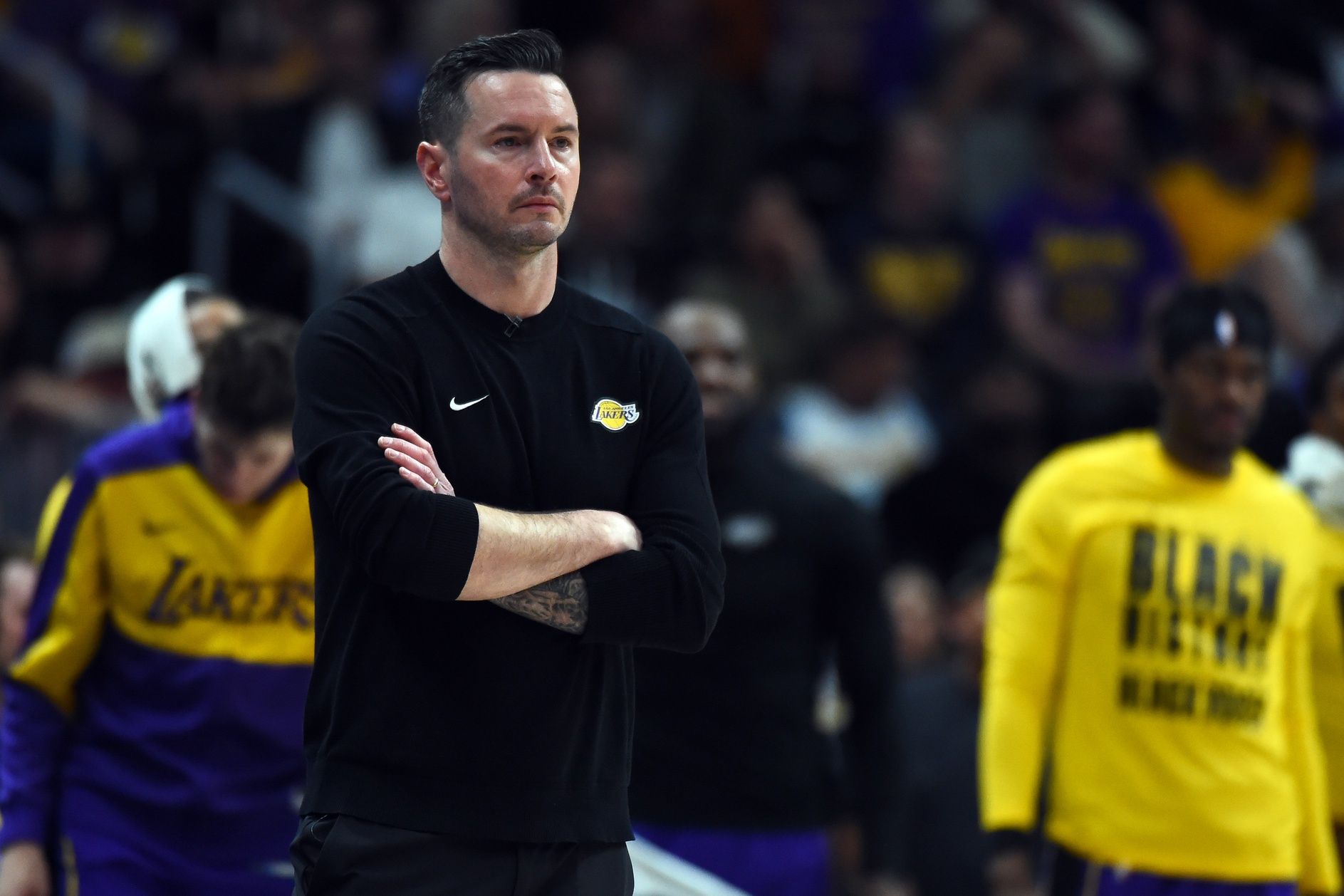 Los Angeles Lakers head coach JJ Redick looks on from the sideline during the second half against the Denver Nuggets at Ball Arena.