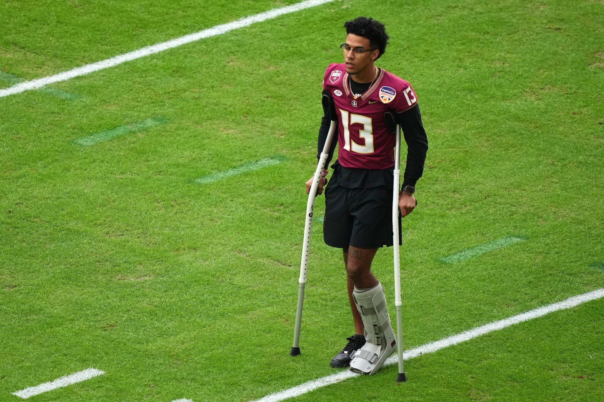 Florida State Seminoles quarterback Jordan Travis (13) before the 2023 Orange Bowl against the Georgia Bulldogs at Hard Rock Stadium.