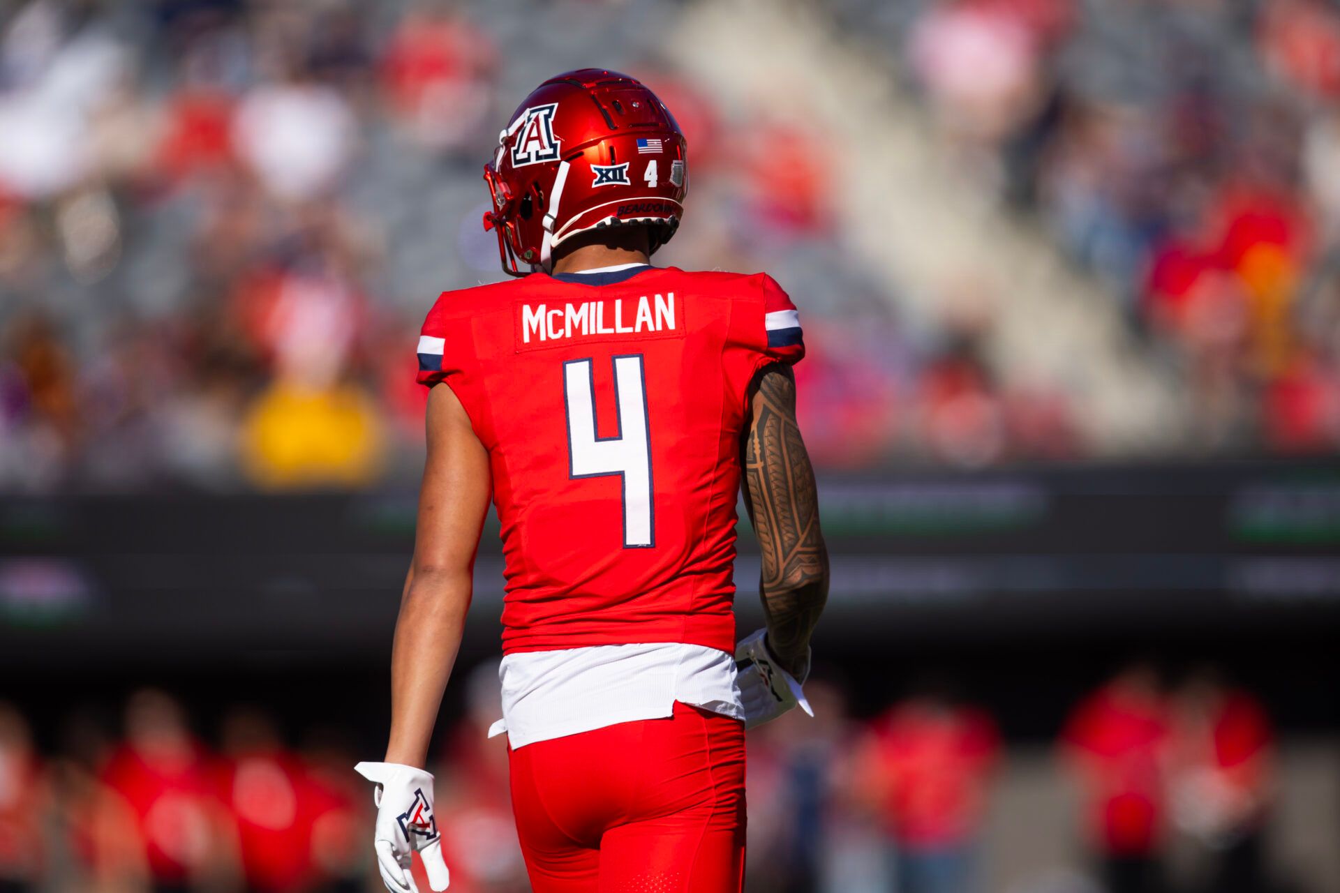 Nov 30, 2024; Tucson, Arizona, USA; Detailed view of the jersey of Arizona Wildcats wide receiver Tetairoa McMillan (4) against the Arizona State Sun Devils during the Territorial Cup at Arizona Stadium. Mandatory Credit: Mark J. Rebilas-Imagn Images