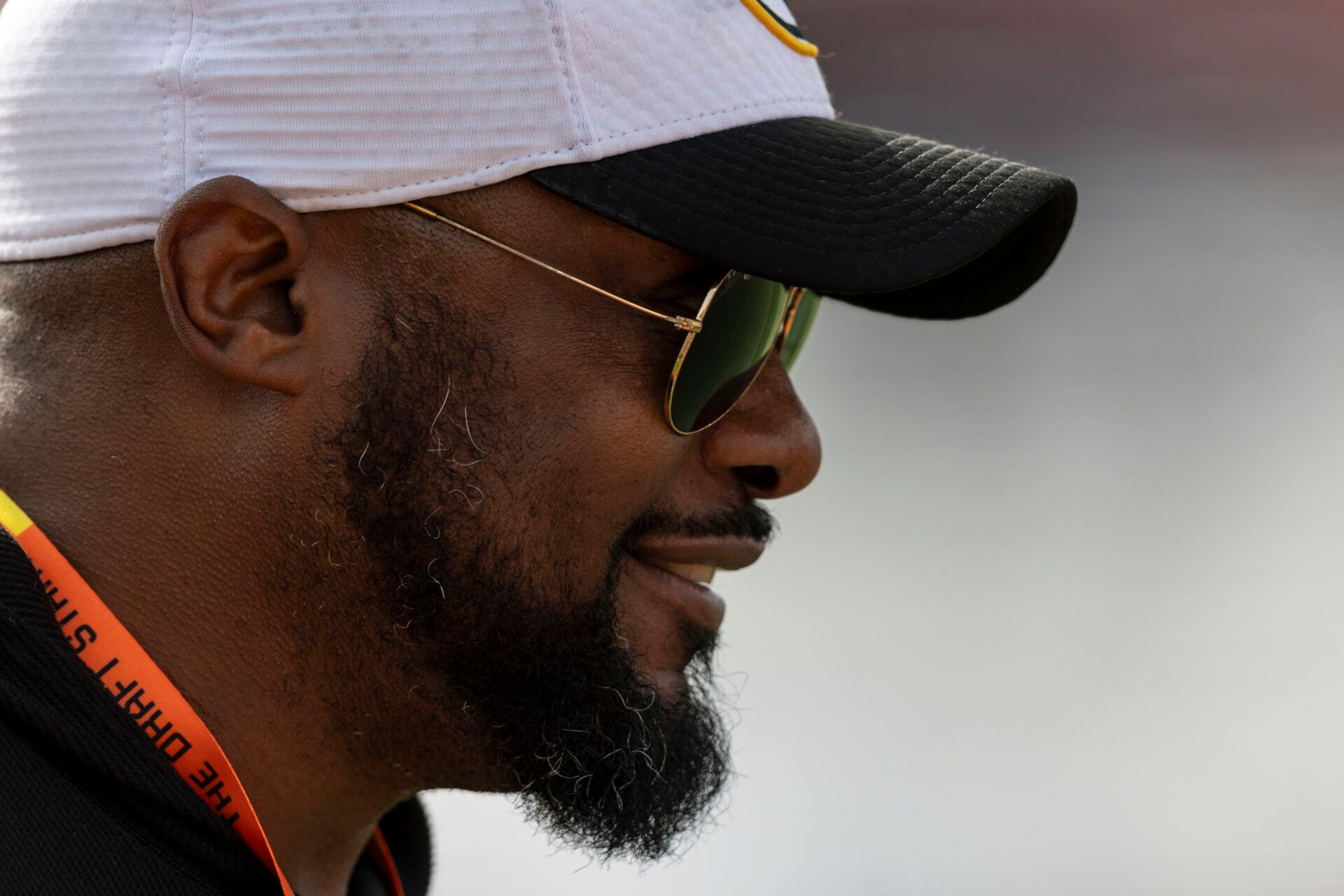 Jan 28, 2025; Mobile, AL, USA; Pittsburgh Steelers head coach Mike Tomlin shares a laugh with players during Senior Bowl practice for the American team at Hancock Whitney Stadium. Mandatory Credit: Vasha Hunt-Imagn Images