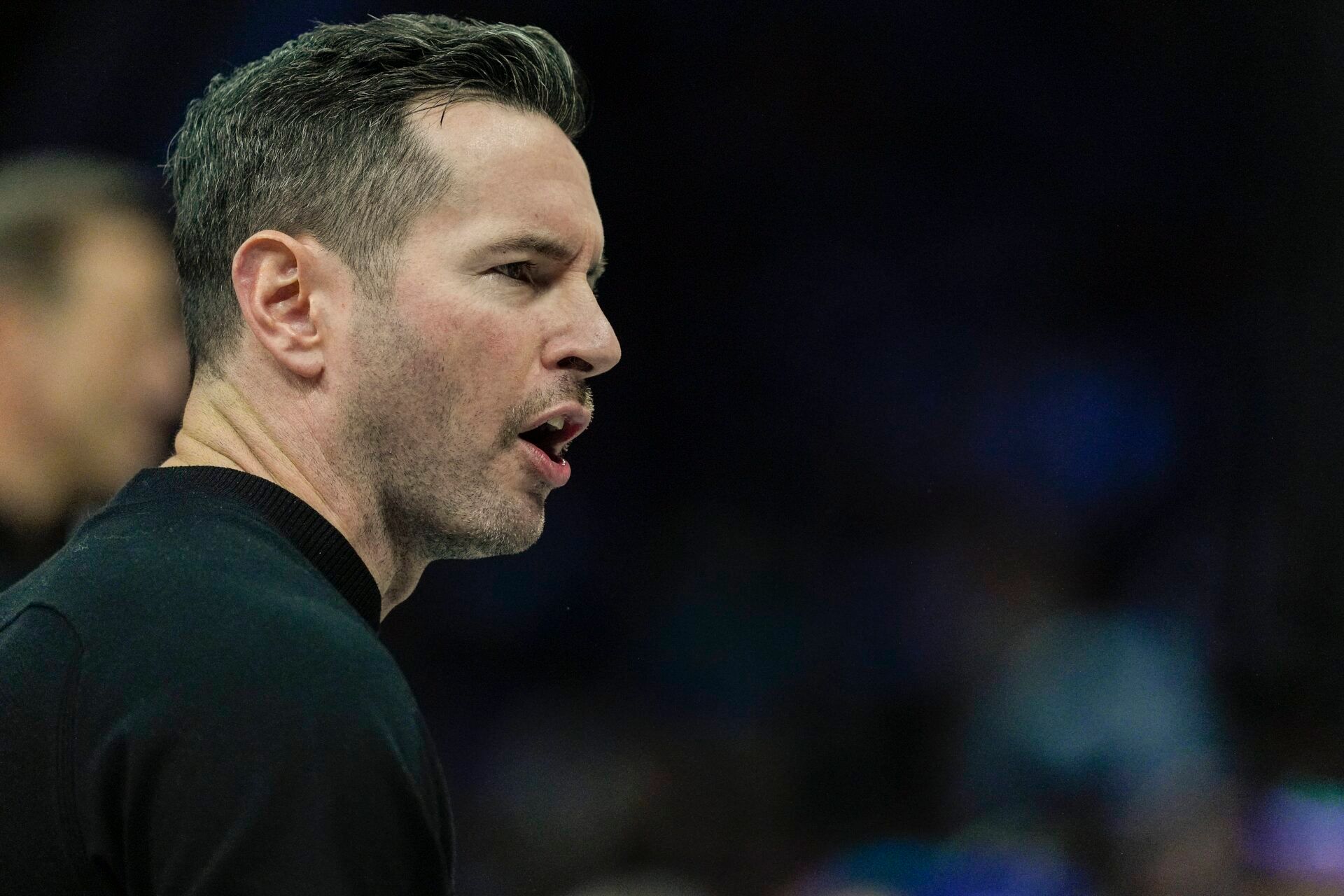 Jan 27, 2025; Charlotte, North Carolina, USA; Los Angeles Lakers head coach J.J. Reddick during the first quarter against the Charlotte Hornets at the Spectrum Center. Mandatory Credit: Jim Dedmon-Imagn Images