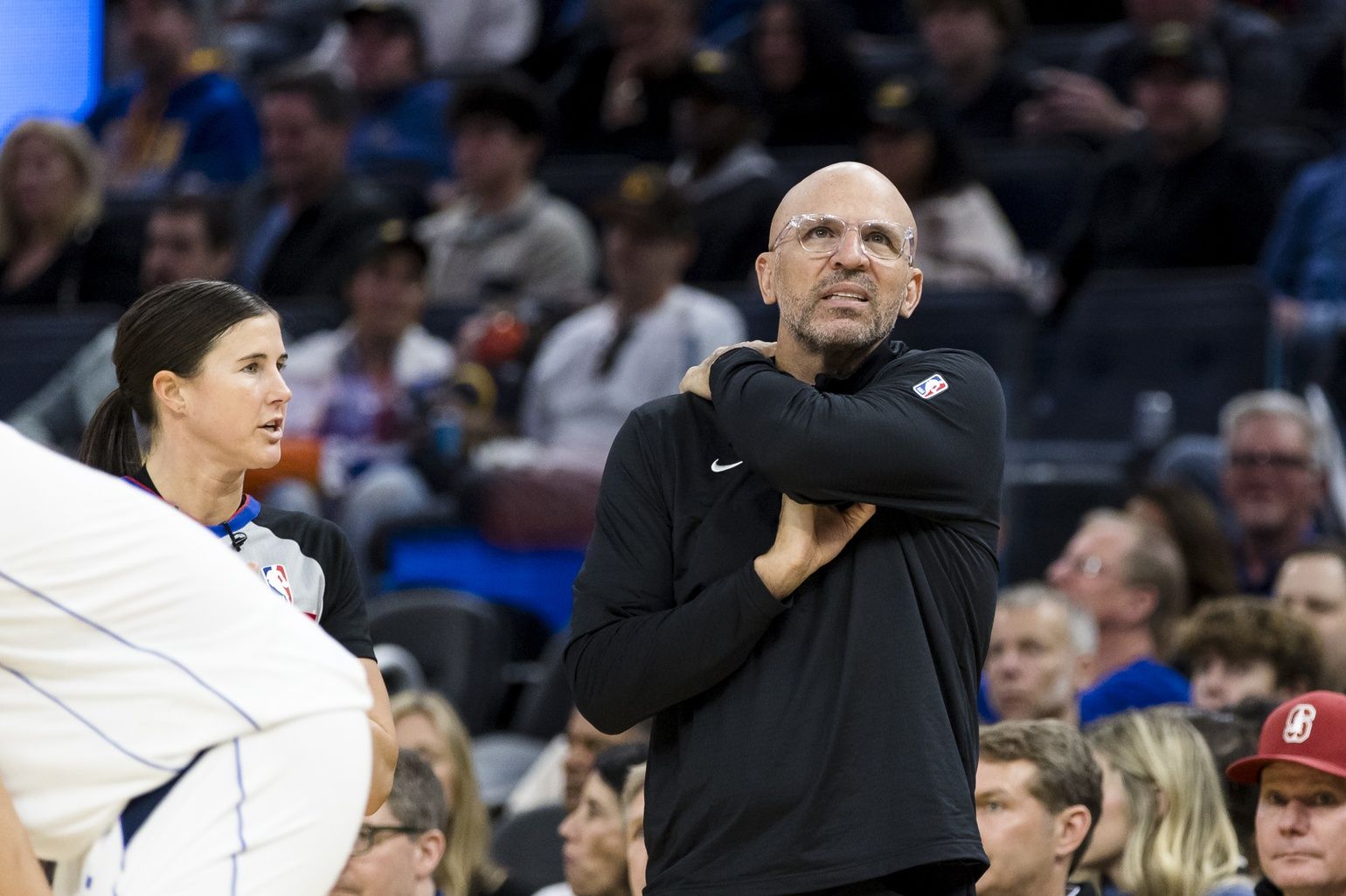 Dallas Mavericks head coach Jason Kidd talks with official Natalie Sago during the third quarter of the game against the Golden State Warriors at Chase Center.