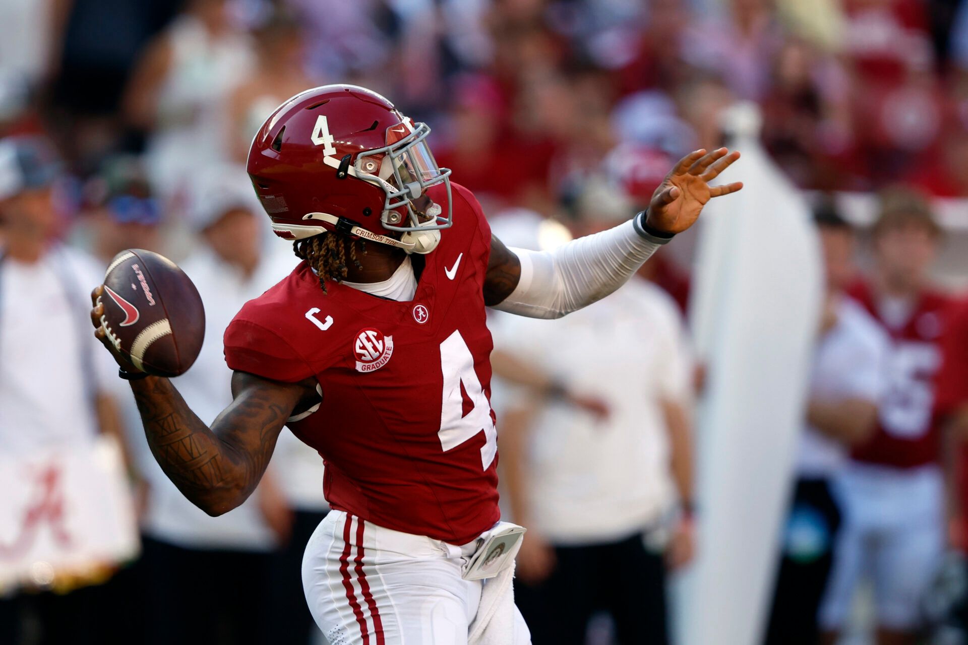 Oct 26, 2024; Tuscaloosa, Alabama, USA; Alabama Crimson Tide quarterback Jalen Milroe (4) throws a pass against the Missouri Tigers during the first half at Bryant-Denny Stadium. Mandatory Credit: Butch Dill-Imagn Images