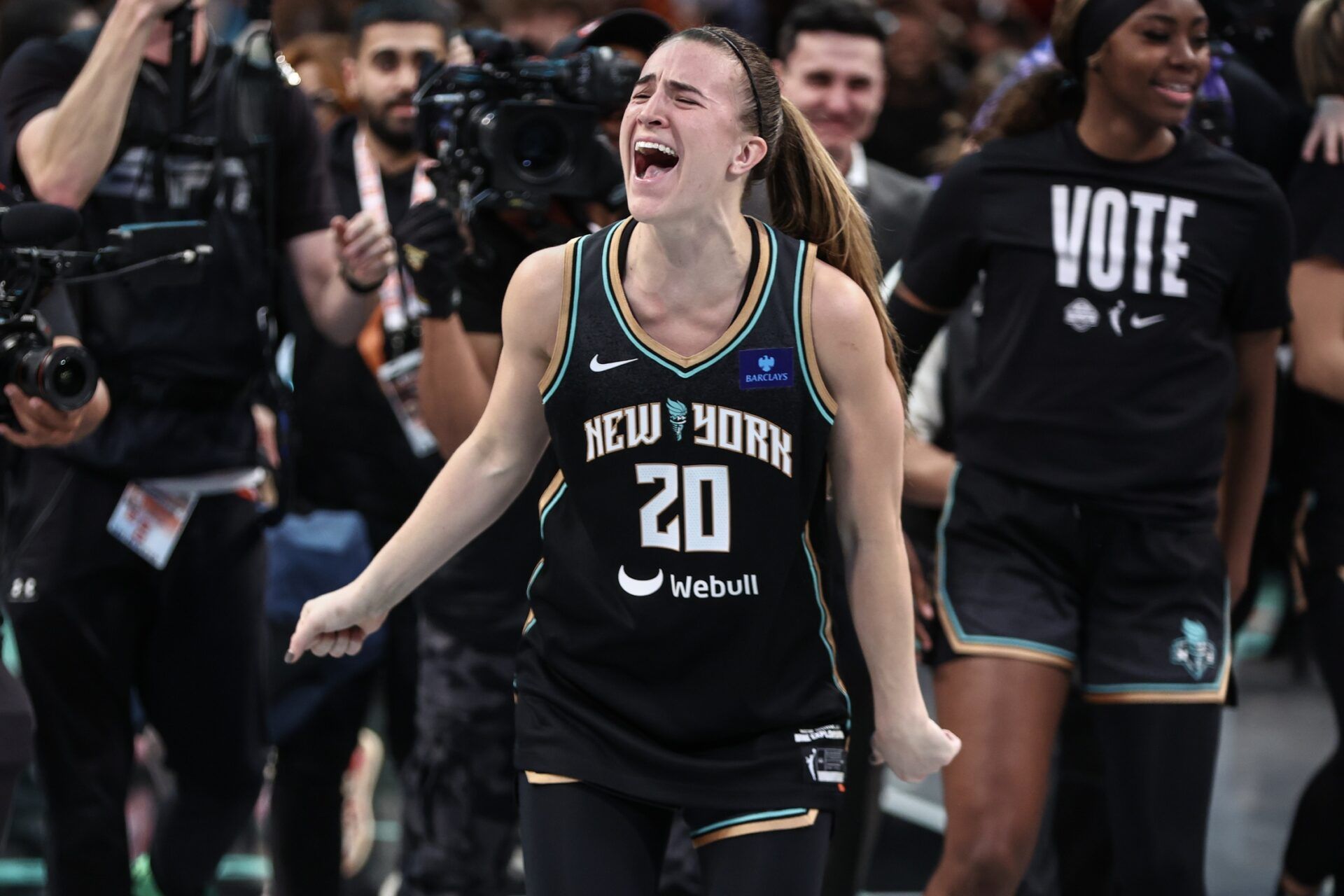 New York Liberty guard Sabrina Ionescu (20) celebrates after defeating the Minnesota Lynx in game five of the 2024 WNBA Finals at Barclays Center.