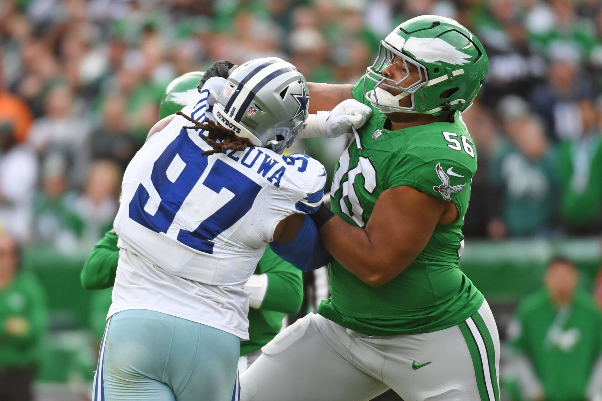 Dec 29, 2024; Philadelphia, Pennsylvania, USA; Philadelphia Eagles guard Tyler Steen (56) blocks Dallas Cowboys defensive tackle Osa Odighizuwa (97) at Lincoln Financial Field. Mandatory Credit: Eric Hartline-Imagn Images