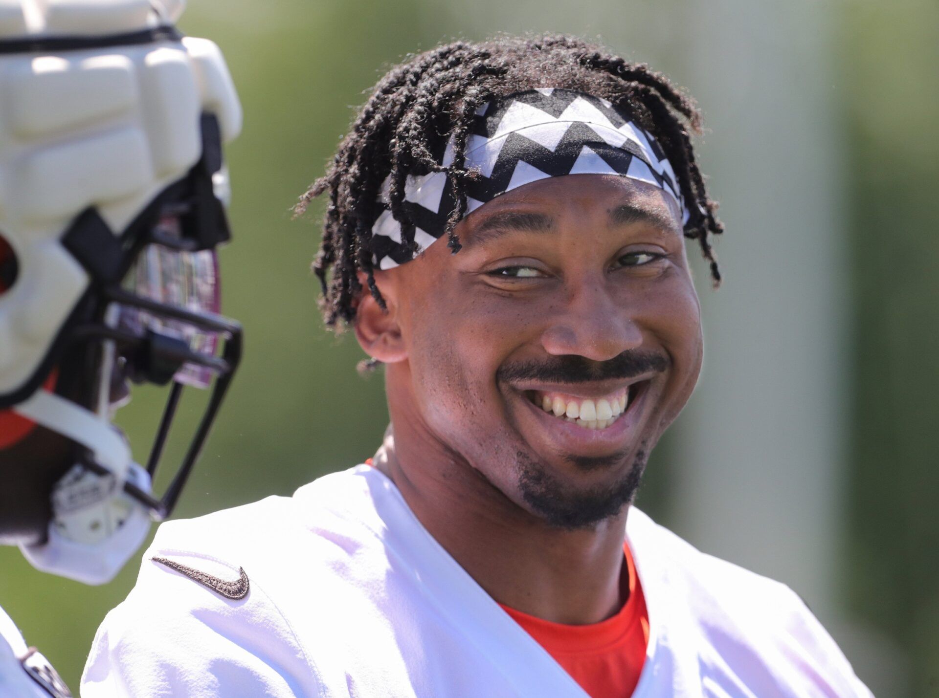 Cleveland Browns defensive end Myles Garrett flashes a smile during training camp.