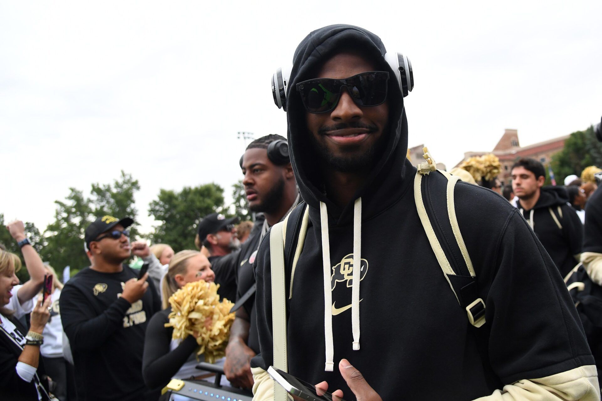 Colorado Buffaloes quarterback Shedeur Sanders (2) walks through Buff Walk before the game against the Baylor Bears at Folsom Field.