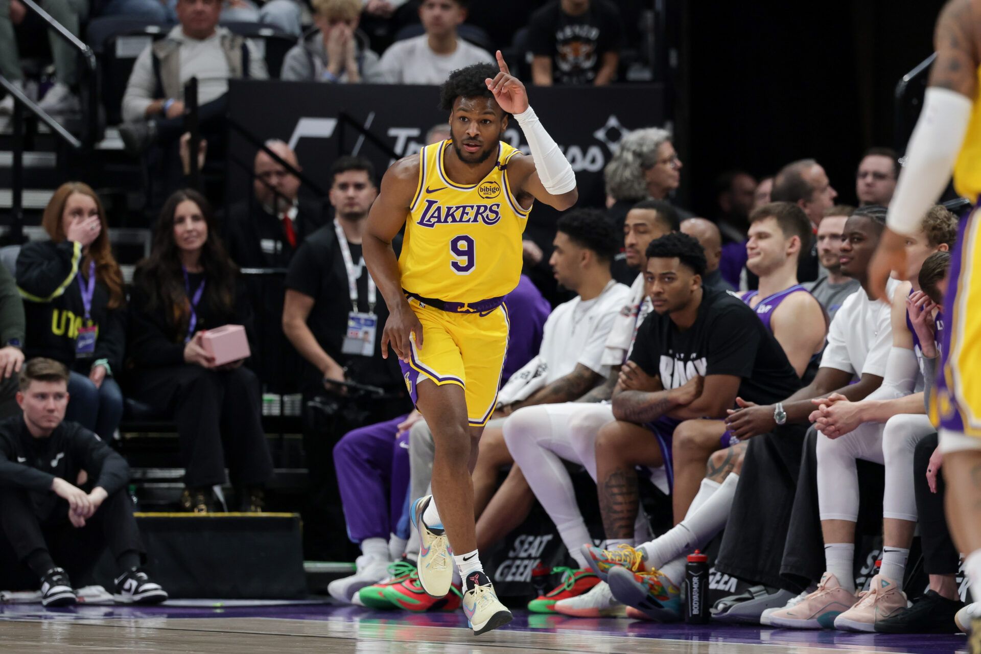 Feb 12, 2025; Salt Lake City, Utah, USA; Los Angeles Lakers guard Bronny James (9) celebrates after making a three point basket during the second half against the Utah Jazz at Delta Center. Mandatory Credit: Chris Nicoll-Imagn Images