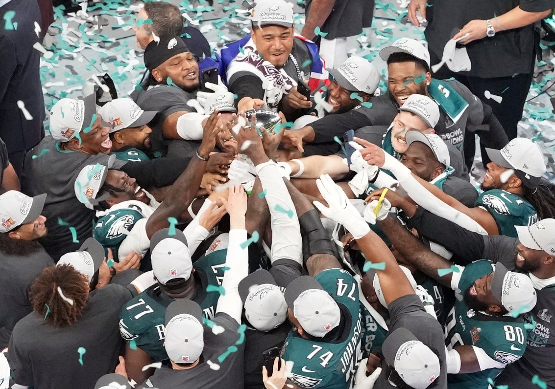 The Philadelphia Eagles lift the Vince Lombardi Trophy after defeating the Kansas City Chiefs 40-22 in Super Bowl LIX at Caesars Superdome.