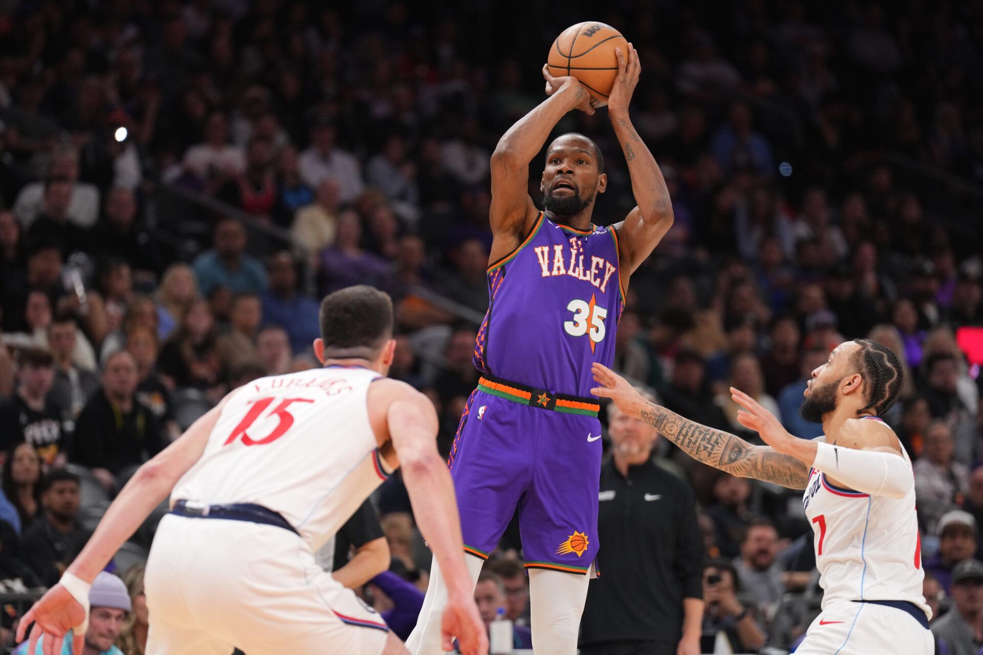 Phoenix Suns forward Kevin Durant (35) shoots over LA Clippers guard Amir Coffey (7) during the second half at PHX Center.