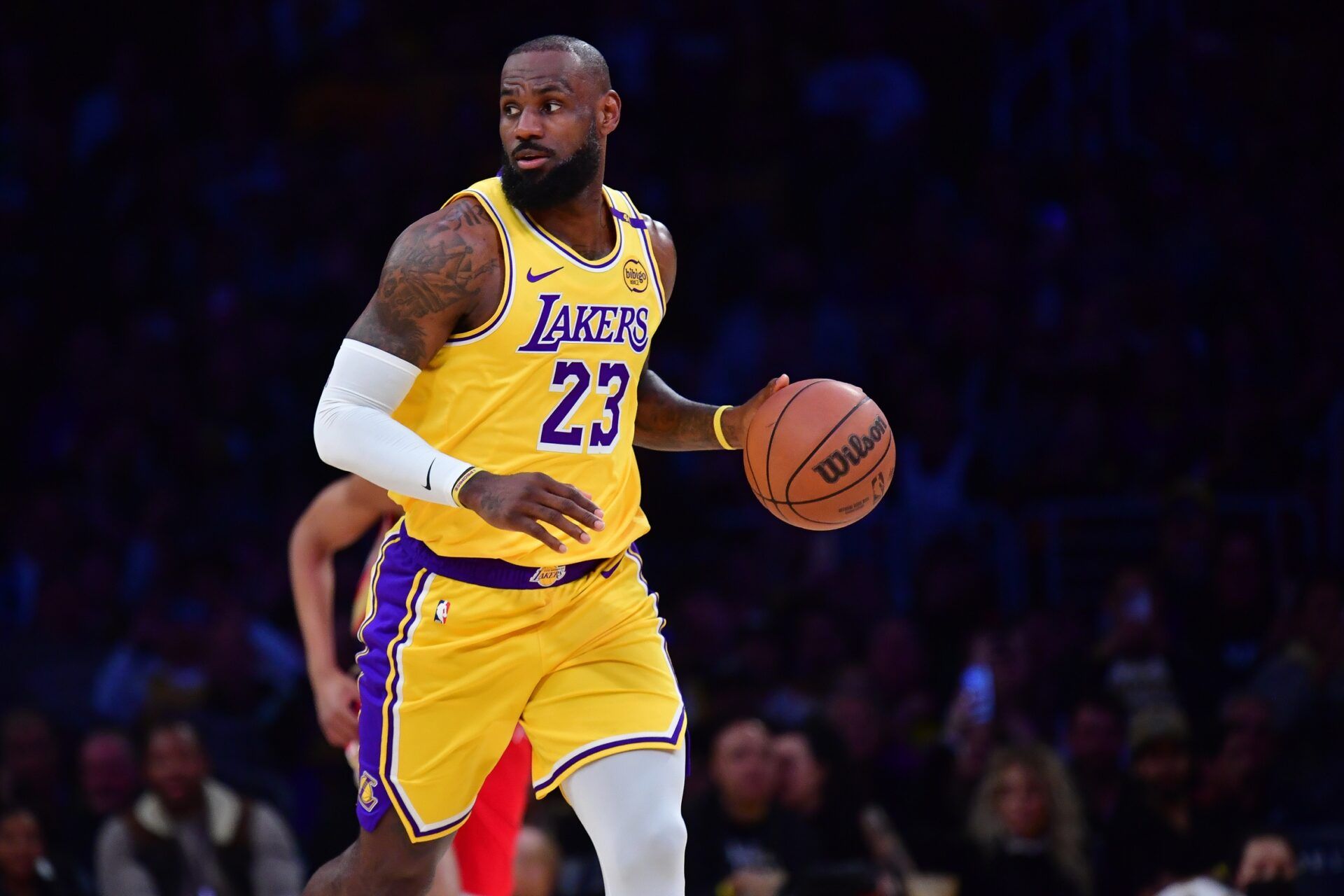 Los Angeles Lakers forward LeBron James (23) controls the ball against the New Orleans Pelicans during the first half at Crypto.com Arena.