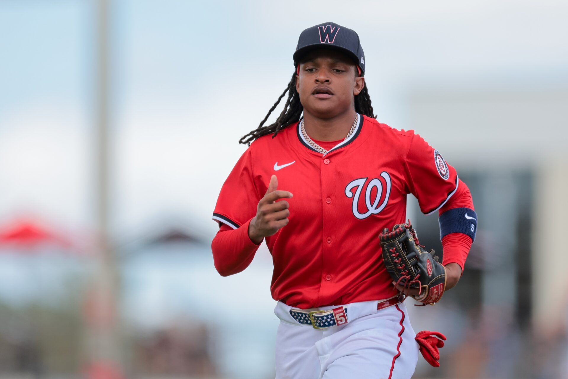 Washington Nationals shortstop CJ Abrams (5) returns to the dugout after the fourth inning against the New York Mets at CACTI Park of the Palm Beaches.