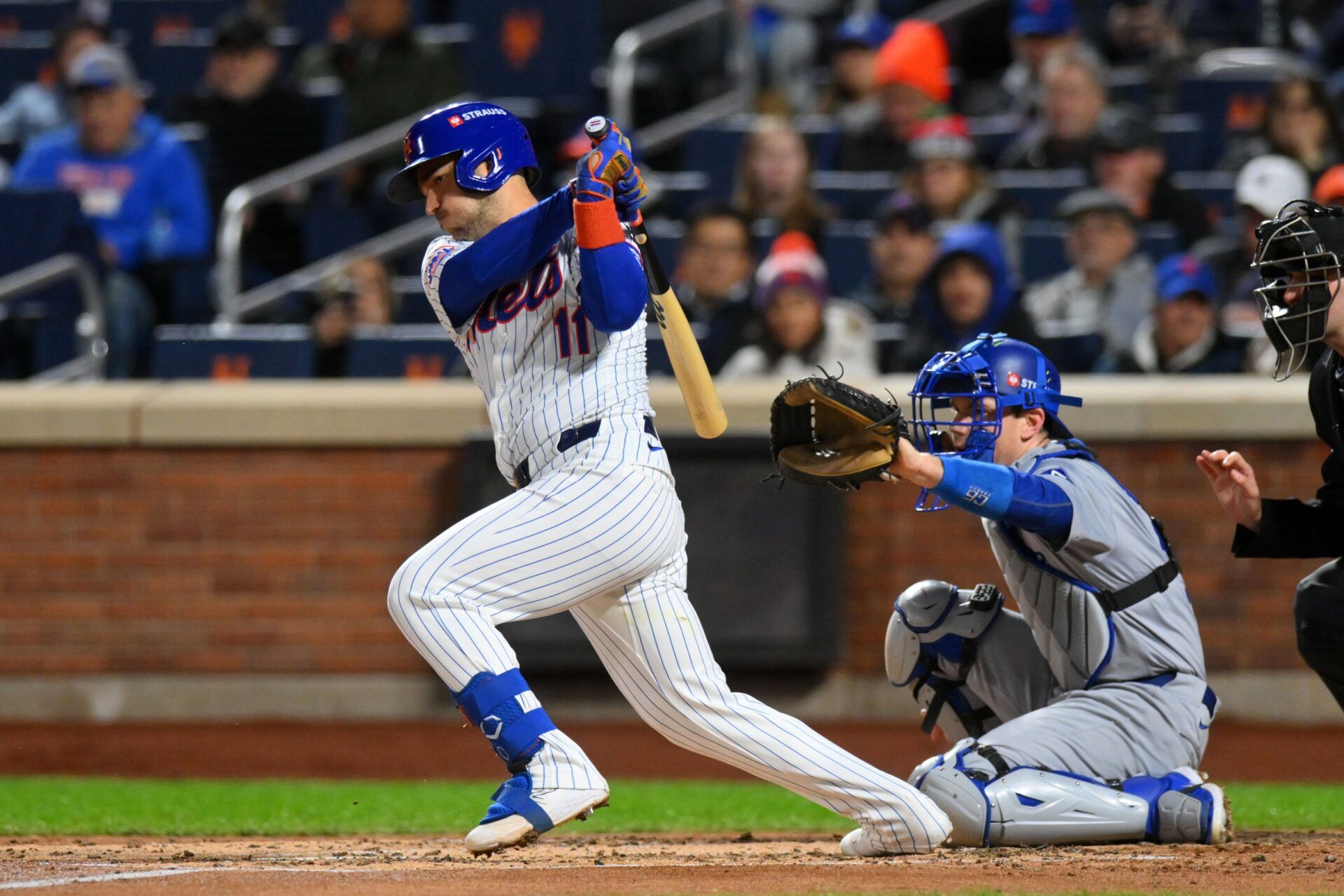 New York Mets second base Jose Iglesias (11) hits a single in the second inning during game four of the NLCS for the 2024 MLB playoffs at Citi Field.