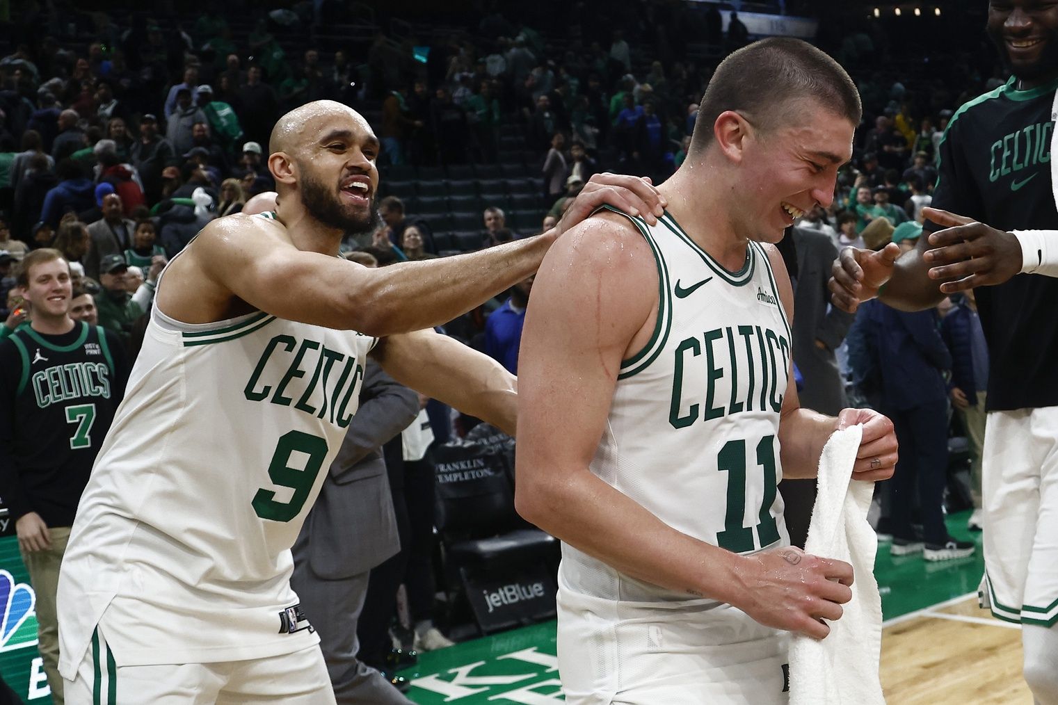 For the first time in Boston Celtics history, two teammates scored over 40 points in a game, Boston Celtics guard Derrick White (9), 41 points, and guard Payton Pritchard (11) ,43 points as they joke around after their win over the Portland Trail Blazers at TD Garden.