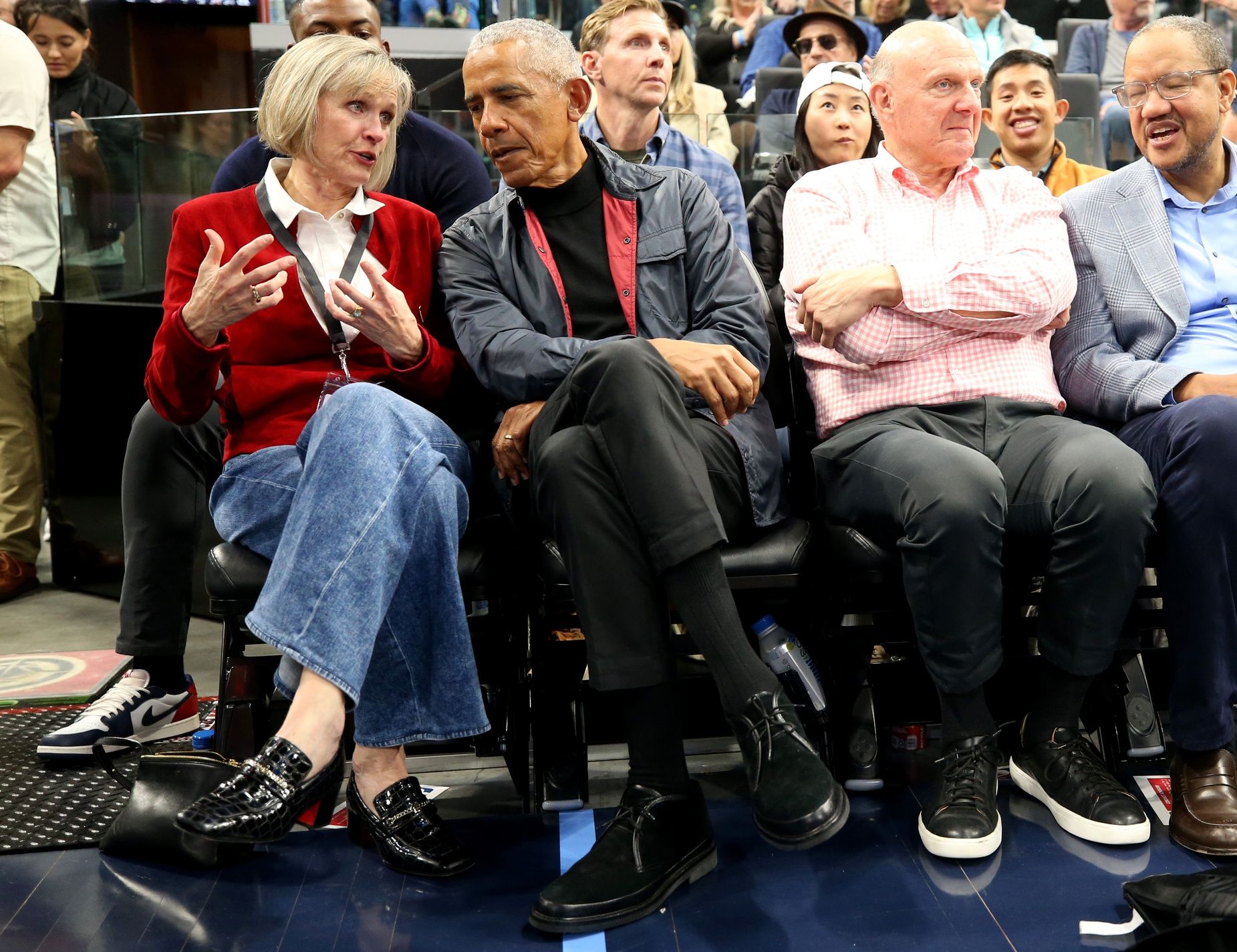 Barack Obama, the 44th President of the United States talks to Connie Snyder, the wife of LA Clippers owner Steve Balmer during the first quarter between the Clippers and the Detroit Pistons at Intuit Dome.