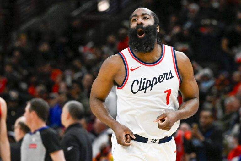 Feb 26, 2025; Chicago, Illinois, USA; LA Clippers guard James Harden (1) looks towards former Chicago Bulls player Pat Beverley, who was on the sidelines, after scoring against the Chicago Bulls during the second half at the United Center. Mandatory Credit: Matt Marton-Imagn Images