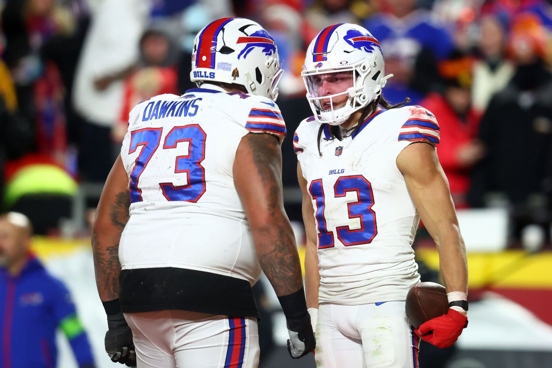 Jan 26, 2025; Kansas City, MO, USA; Buffalo Bills wide receiver Mack Hollins (13) reacts with offensive tackle Dion Dawkins (73) after scoring a touchdown against the Kansas City Chiefs during the first half in the AFC Championship game at GEHA Field at Arrowhead Stadium. Mandatory Credit: Mark J. Rebilas-Imagn Images