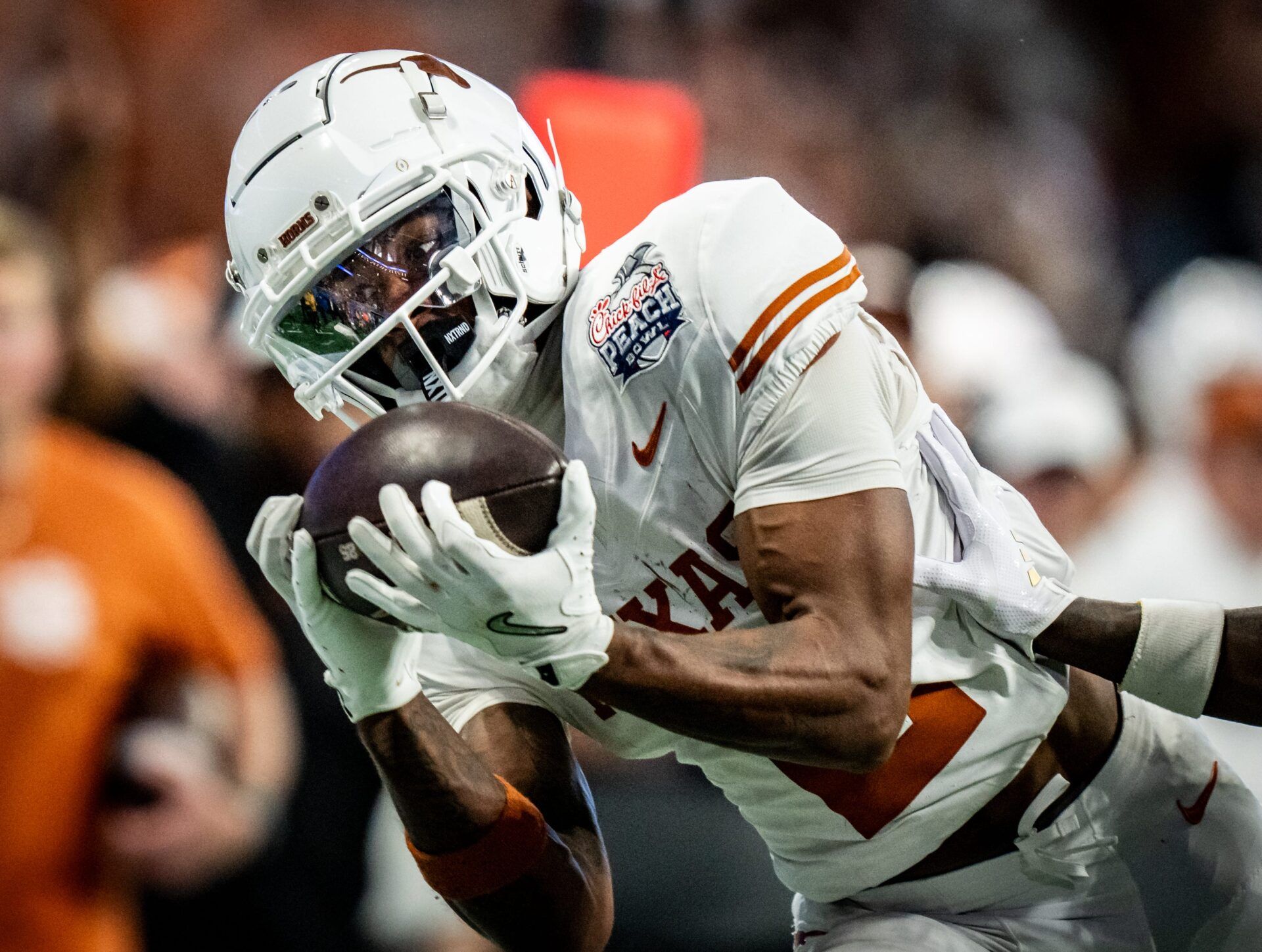 Texas Longhorns wide receiver Matthew Golden (2) catches a long pass for a first down near the end zone in the fourth quarter as the Texas Longhorns play the Arizona State Sun Devils in the Peach Bowl College Football Playoff quarterfinal at Mercedes-Benz Stadium in Atlanta, Georgia, Jan. 1, 2025.