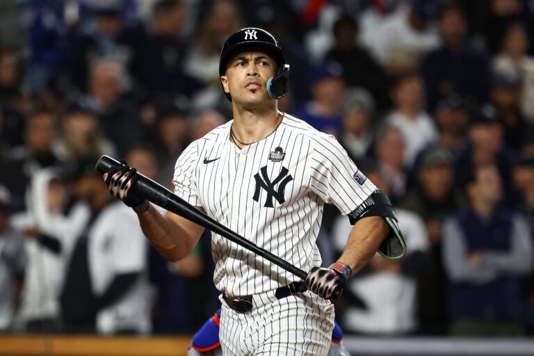 Oct 29, 2024; Bronx, New York, USA; New York Yankees designated hitter Giancarlo Stanton (27) reacts after striking out against the Los Angeles Dodgers in the fifth inning during game four of the 2024 MLB World Series at Yankee Stadium. Mandatory Credit: Vincent Carchietta-Imagn Images