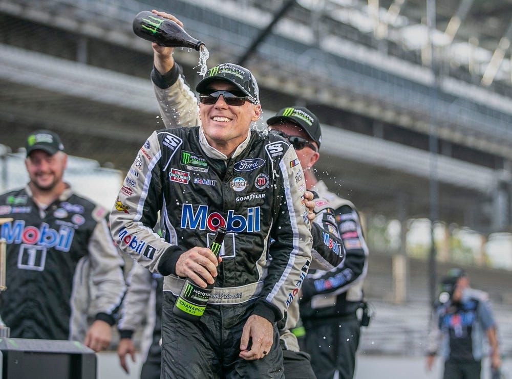 Monster Energy NASCAR Cup Series driver Kevin Harvick (4) is drenched in champagne after winning the 2019 Big Machine Vodka 400 at the Brickyard at Indianapolis Motor Speedway on Sunday, Sept. 8, 2019.