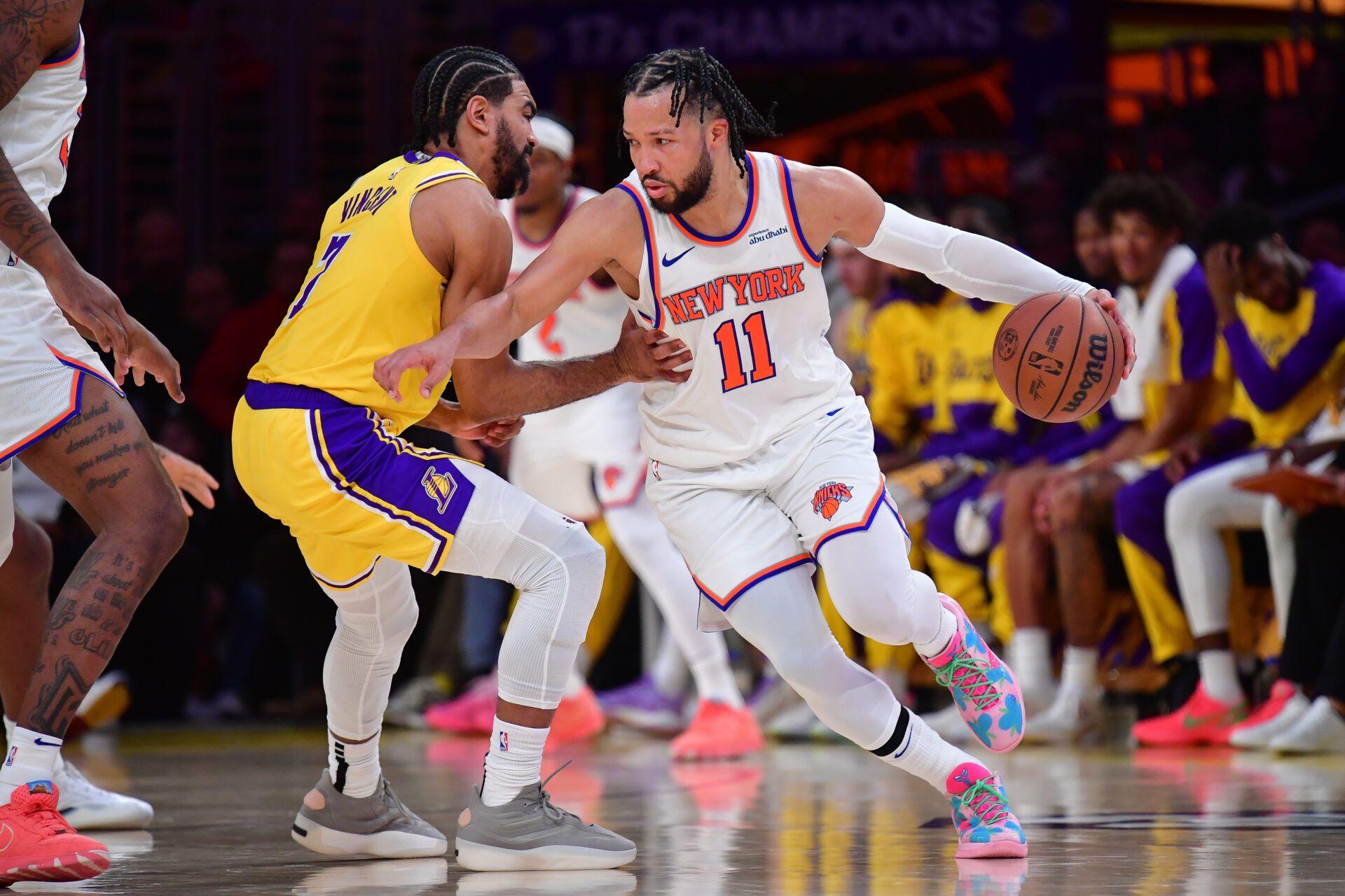 Mar 6, 2025; Los Angeles, California, USA; New York Knicks guard Jalen Brunson (11) moves the ball against Los Angeles Lakers guard Gabe Vincent (7) during the second half at Crypto.com Arena. Mandatory Credit: Gary A. Vasquez-Imagn Images