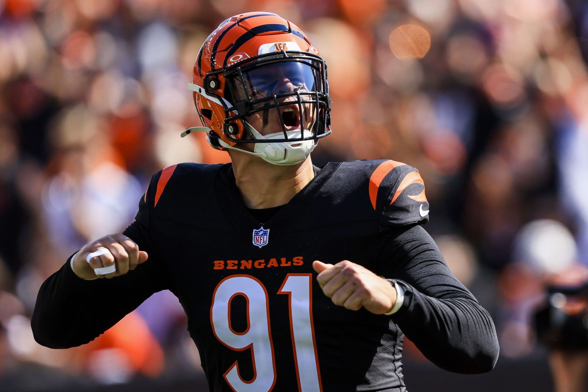 Cincinnati Bengals defensive end Trey Hendrickson (91) runs onto the field before the game against the Baltimore Ravens at Paycor Stadium.