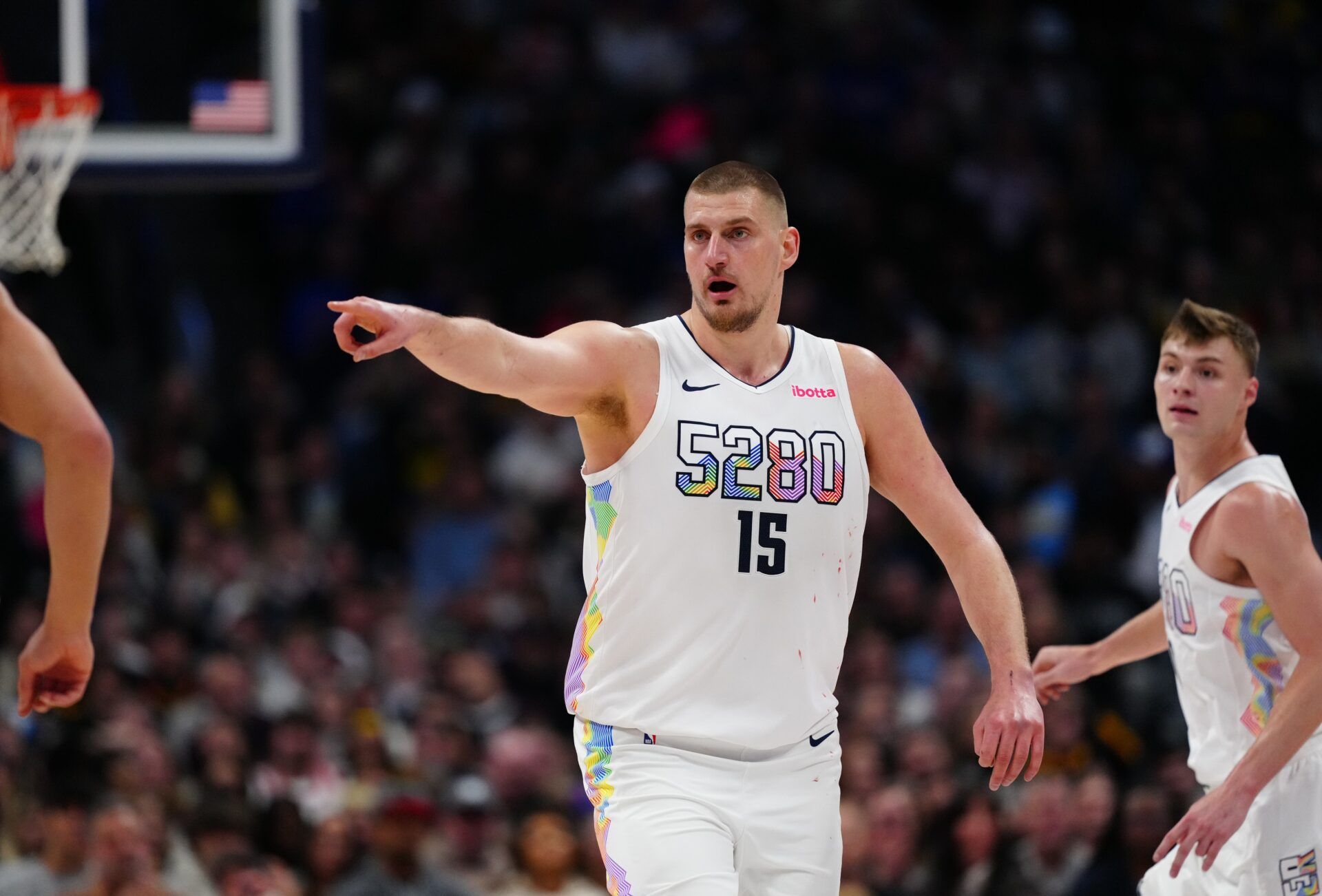 Denver Nuggets center Nikola Jokic (15) points in the second half against the Phoenix Suns at Ball Arena.