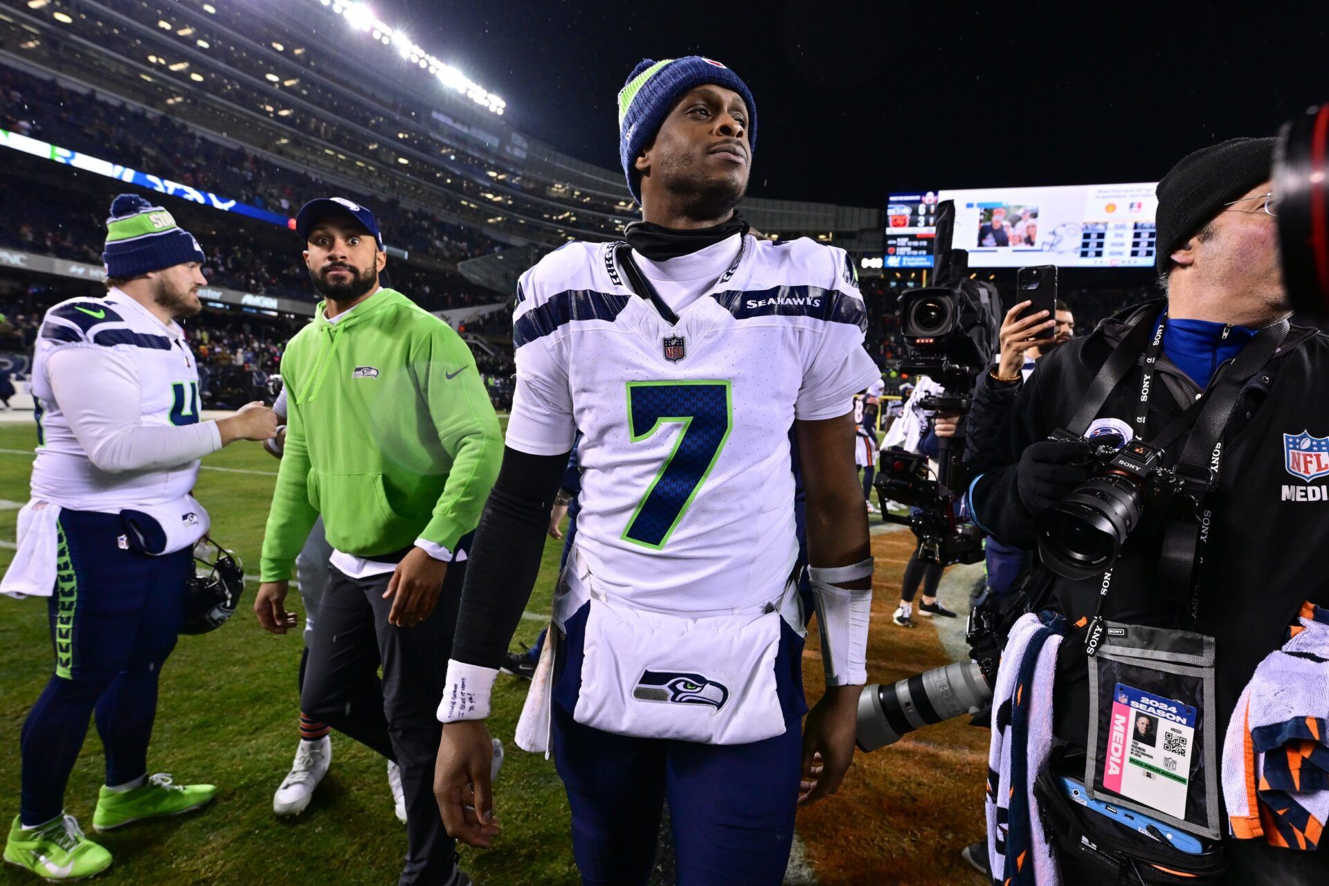 Seattle Seahawks quarterback Geno Smith (7) walks off the field after the game against the Chicago Bears at Soldier Field.