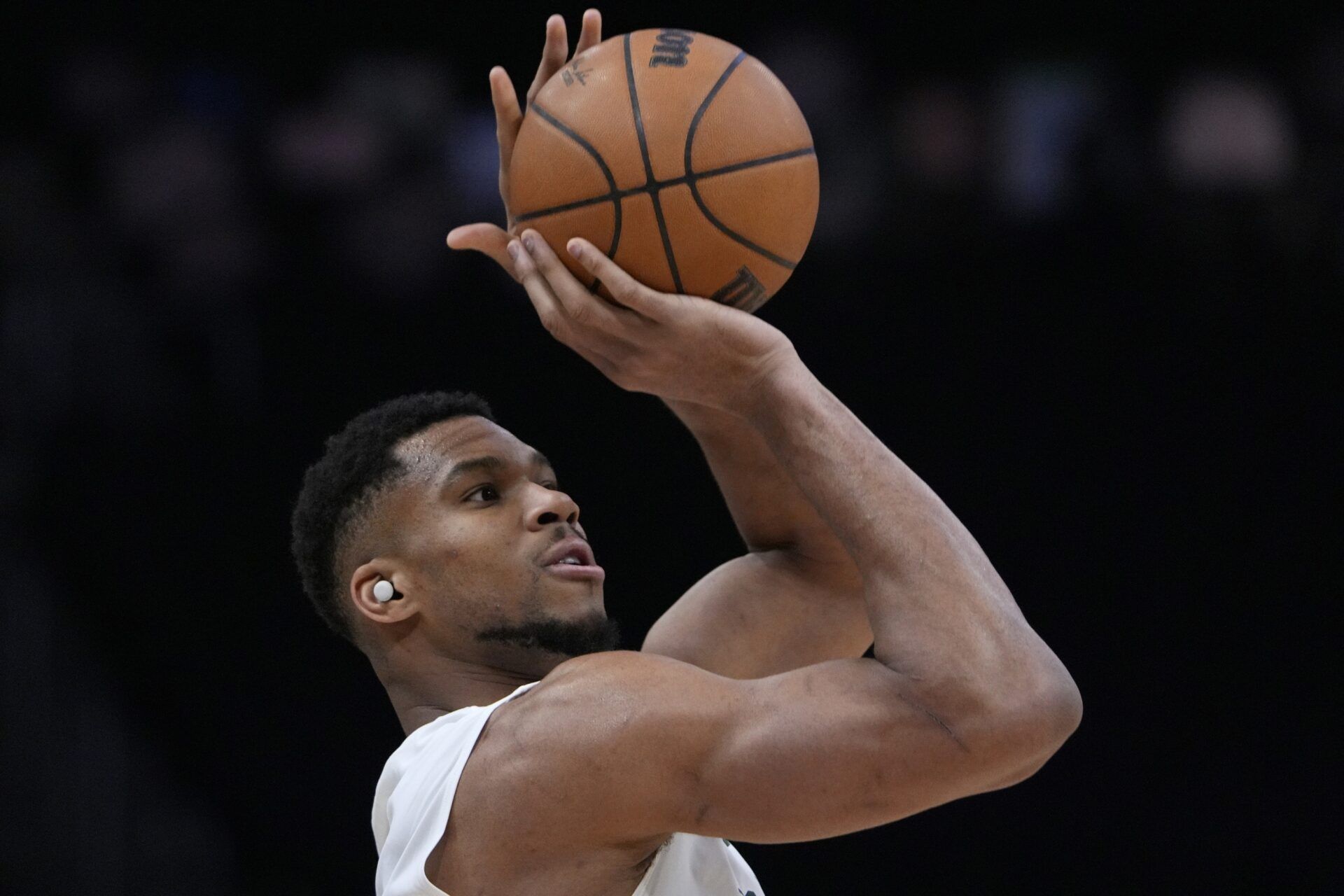 Milwaukee Bucks forward Giannis Antetokounmpo (34) shoots during pregame warmups before a game against the Orlando Magic at Fiserv Forum.