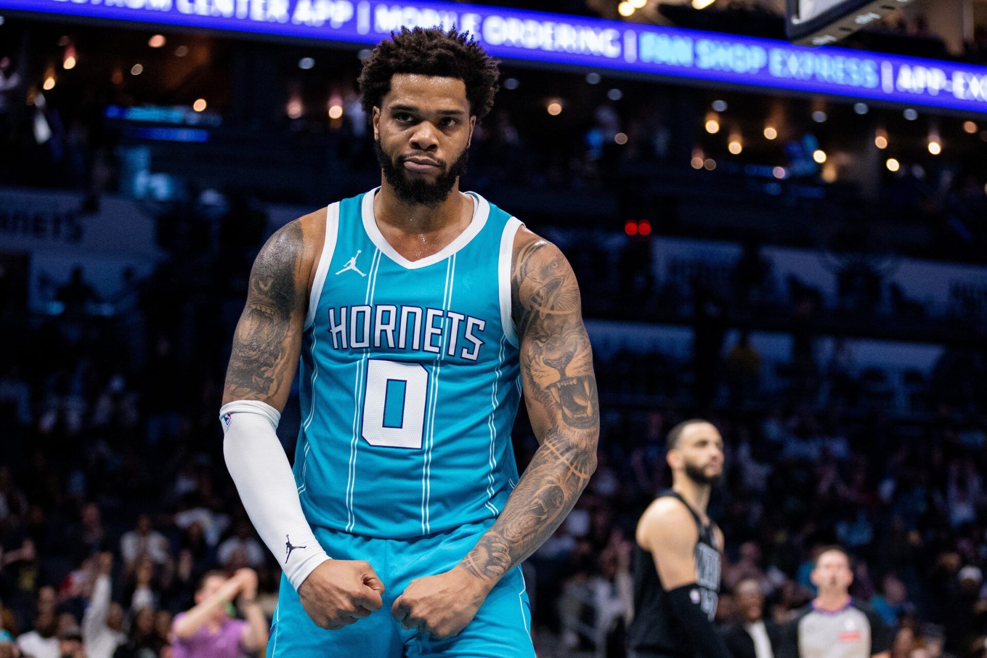 Charlotte Hornets forward Miles Bridges (0) celebrates after scoring against the Brooklyn Nets during the fourth quarter at Spectrum Center.