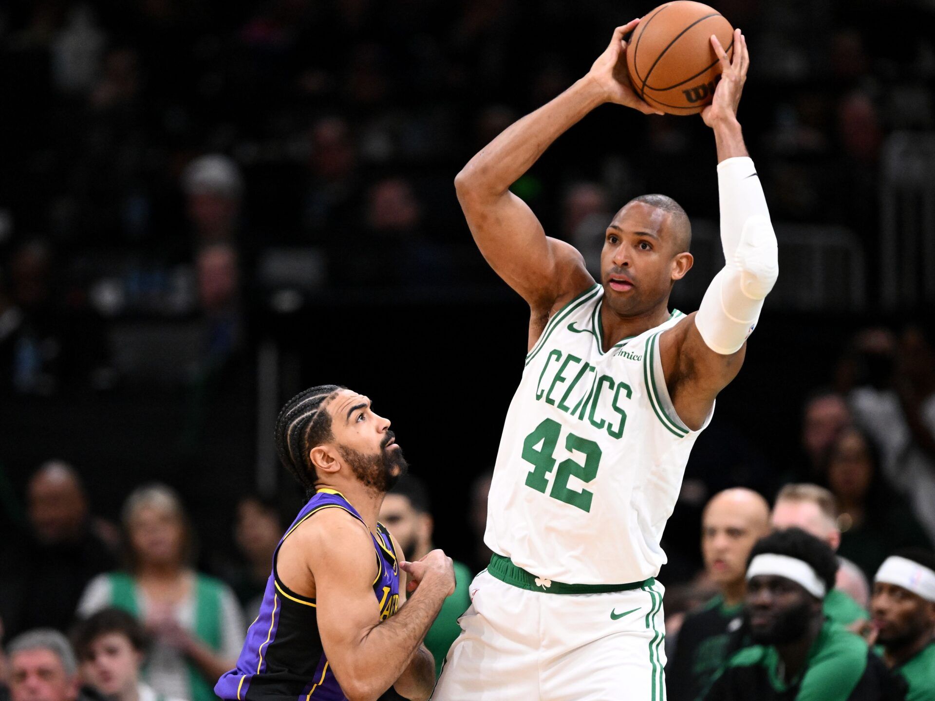 Boston Celtics center Al Horford (42) passes the ball against the Los Angeles Lakers during the second quarter at the TD Garden.
