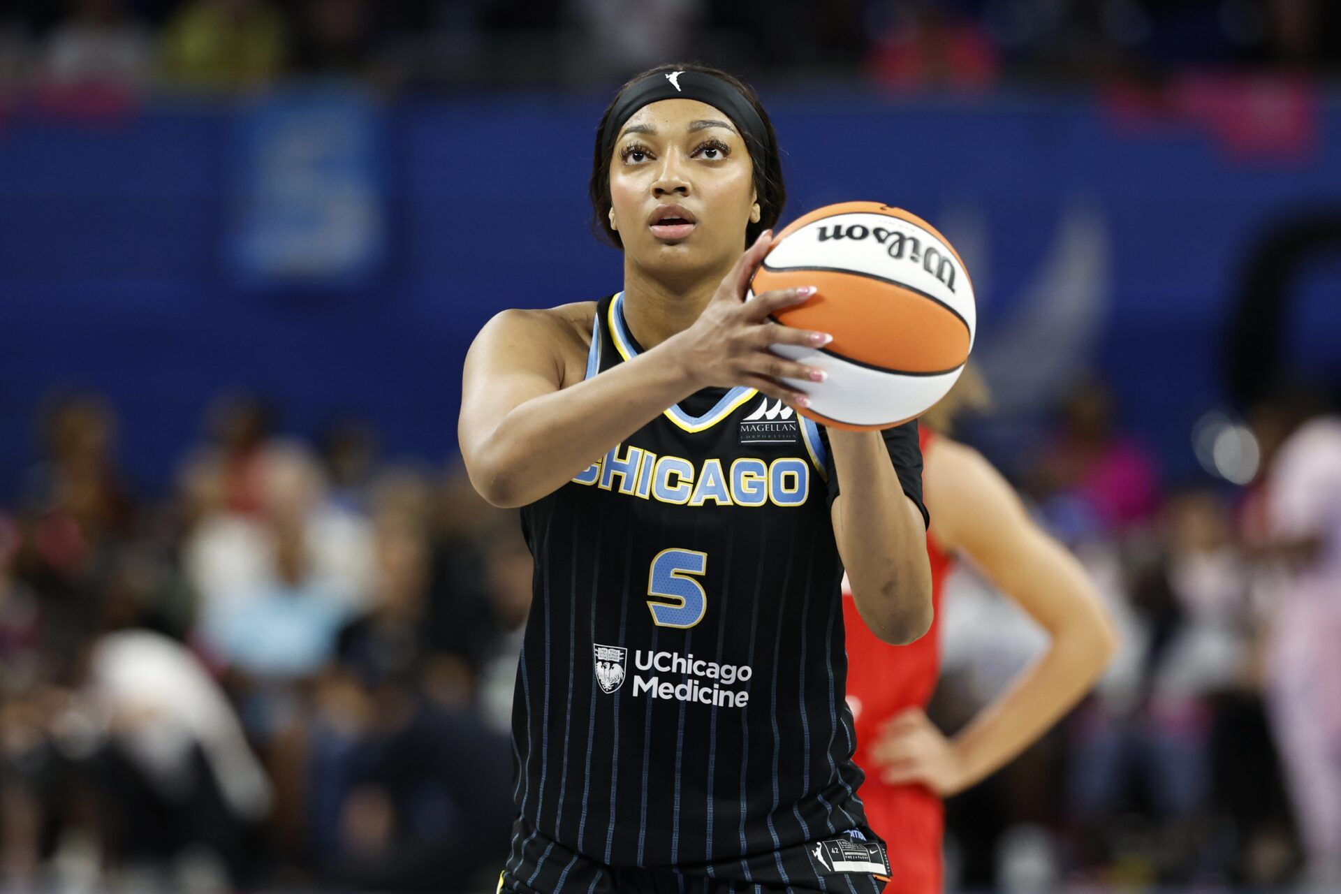 Chicago Sky forward Angel Reese (5) shoots a free throw against the Indiana Fever during the second half at Wintrust Arena.