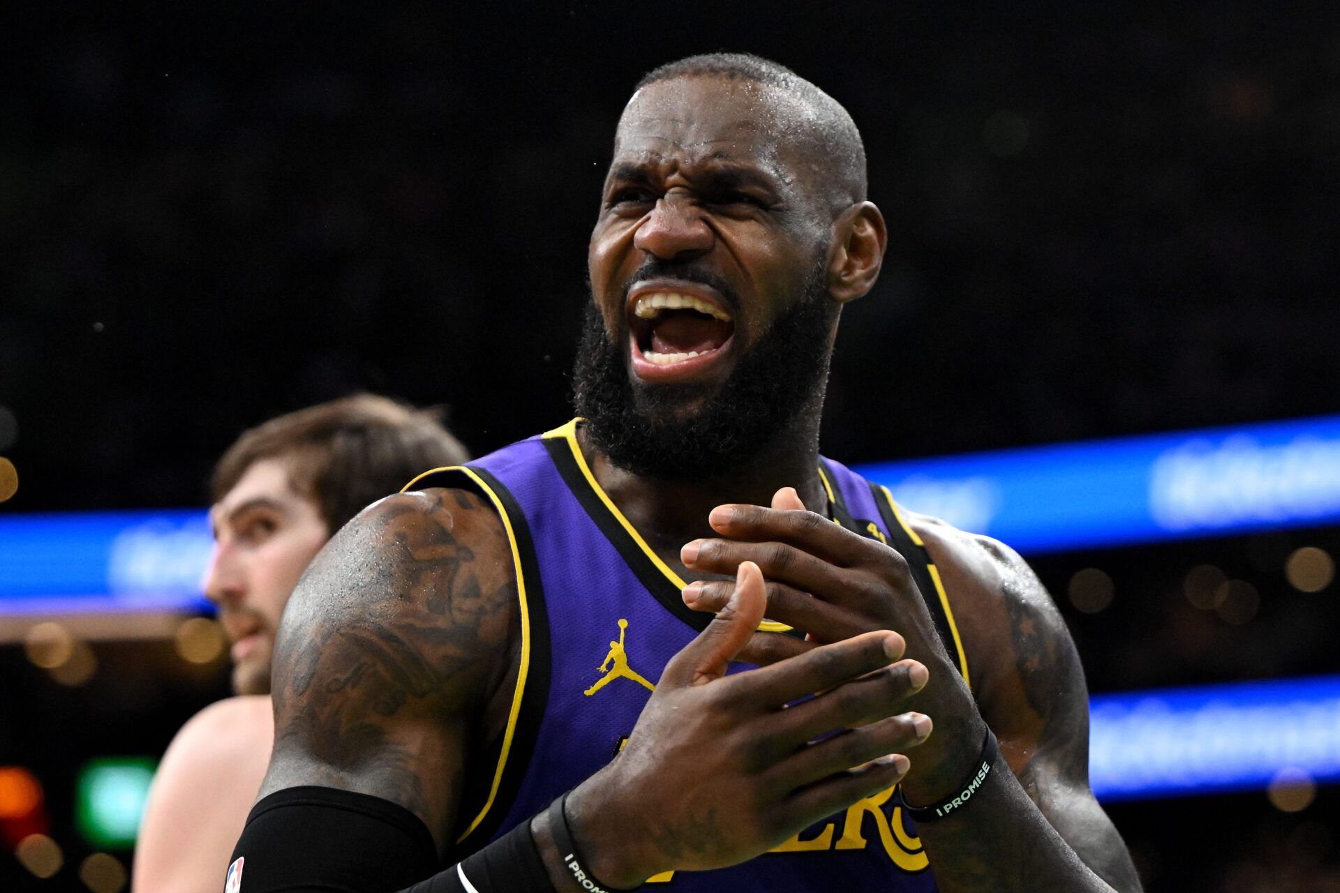 Los Angeles Lakers forward LeBron James (23) reacts after a non-call against the Boston Celtics during the second quarter at the TD Garden.