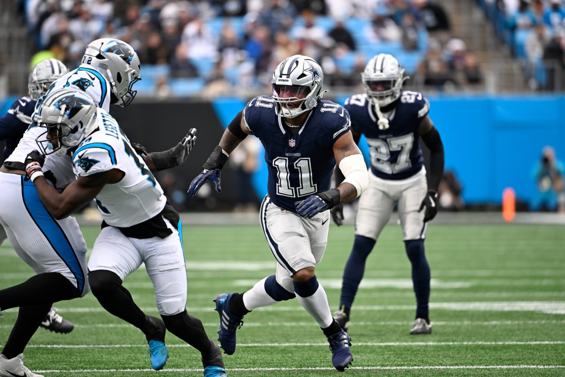 Dallas Cowboys linebacker Micah Parsons (11) on the field in the first quarter at Bank of America Stadium.