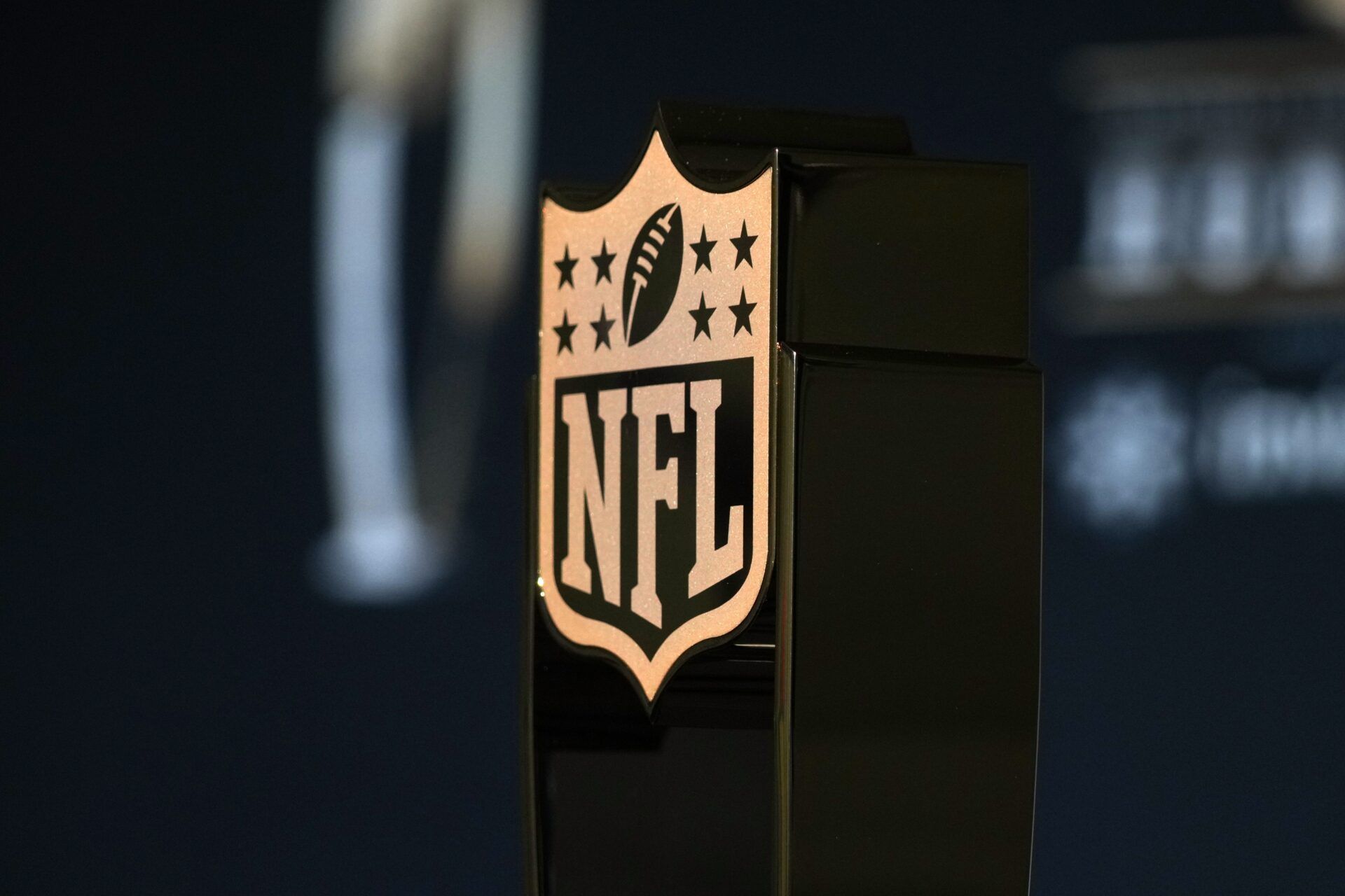 A NFL shield logo on an Honors trophy at the Super Bowl LIX NFL Honors at Saenger Theatre.