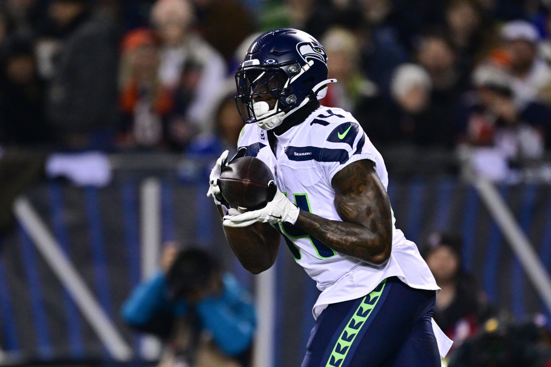 Dec 26, 2024; Chicago, Illinois, USA; Seattle Seahawks wide receiver DK Metcalf (14) makes a catch against the Chicago Bears during the first quarter at Soldier Field. Mandatory Credit: Daniel Bartel-Imagn Images