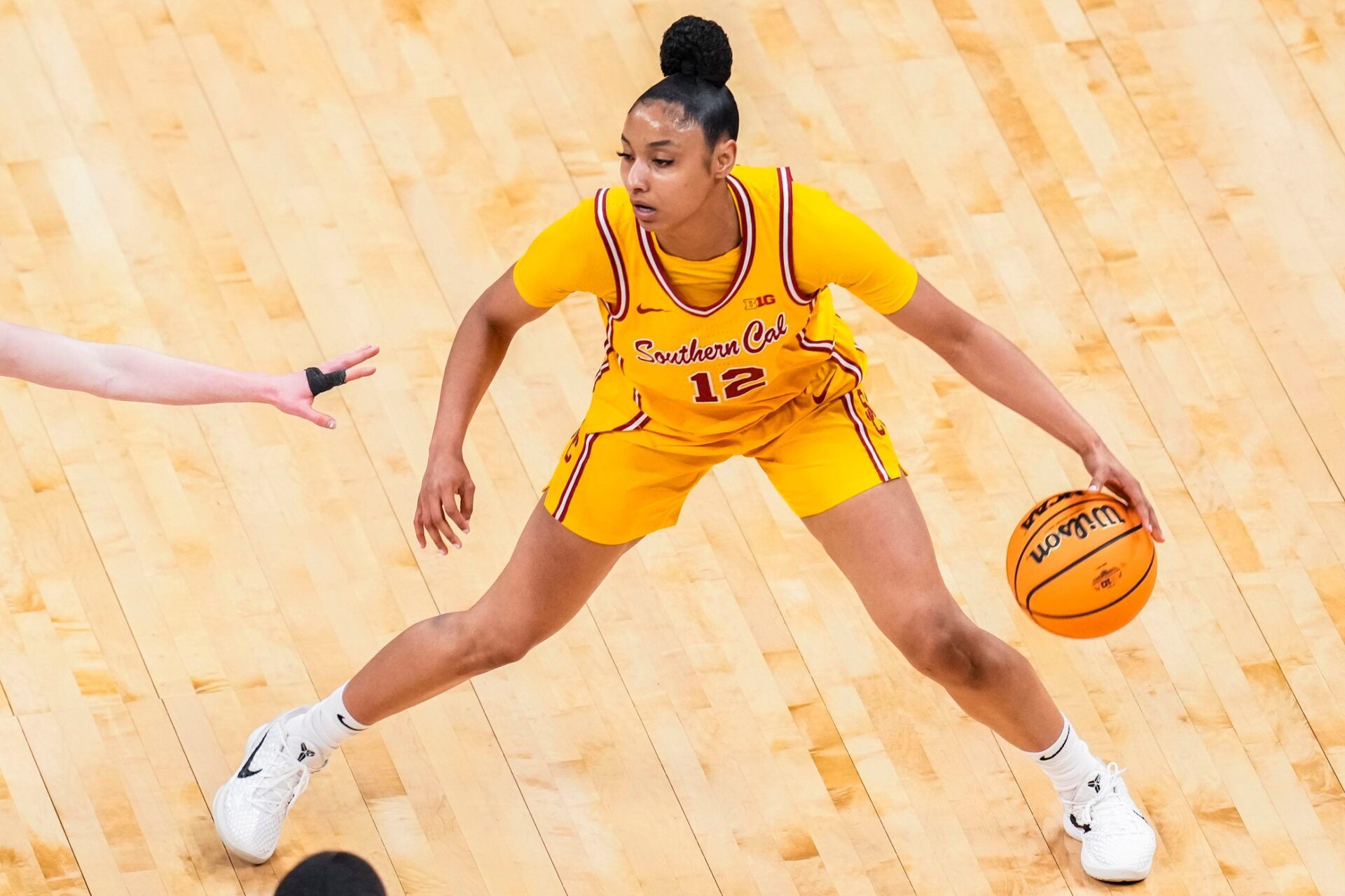 USC Trojans guard JuJu Watkins (12) runs a play Saturday, March 8, 2025, in a semifinals game at the 2025 TIAA Big Ten Women's Basketball Tournament between the Iowa Hawkeyes and the Ohio State Buckeyes at Gainbridge Fieldhouse in Indianapolis.