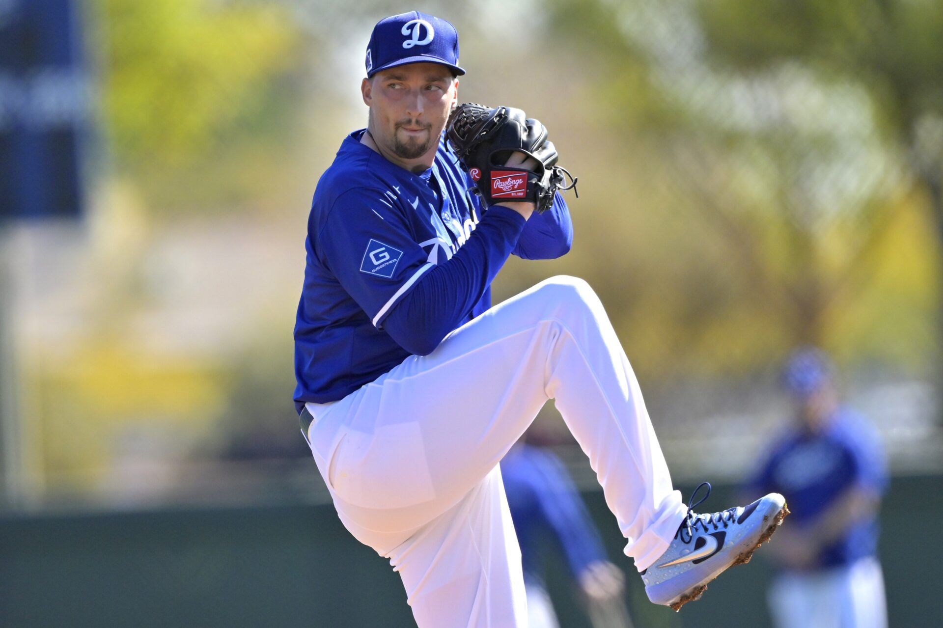 Los Angeles Dodgers starting pitcher Blake Snell (7) throws live batting practice during spring training workouts at Camelback Ranch.